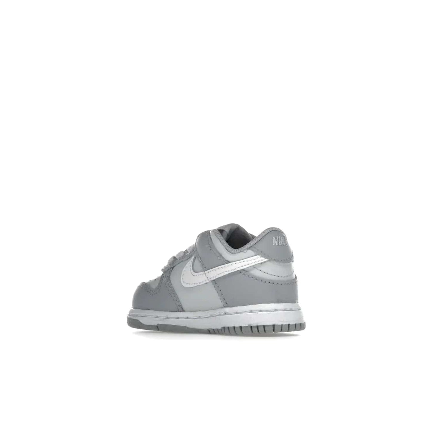 Nike Dunk Low Two-Toned Grey (TD) - Image 23 - Only at www.BallersClubKickz.com - Clean and sharp Nike Dunk Low Two-Toned Grey (TD) release on March 1, 2022. Pure Platinum and White-Wolf Grey design with extra-cushioned midsole for optimal comfort and style.