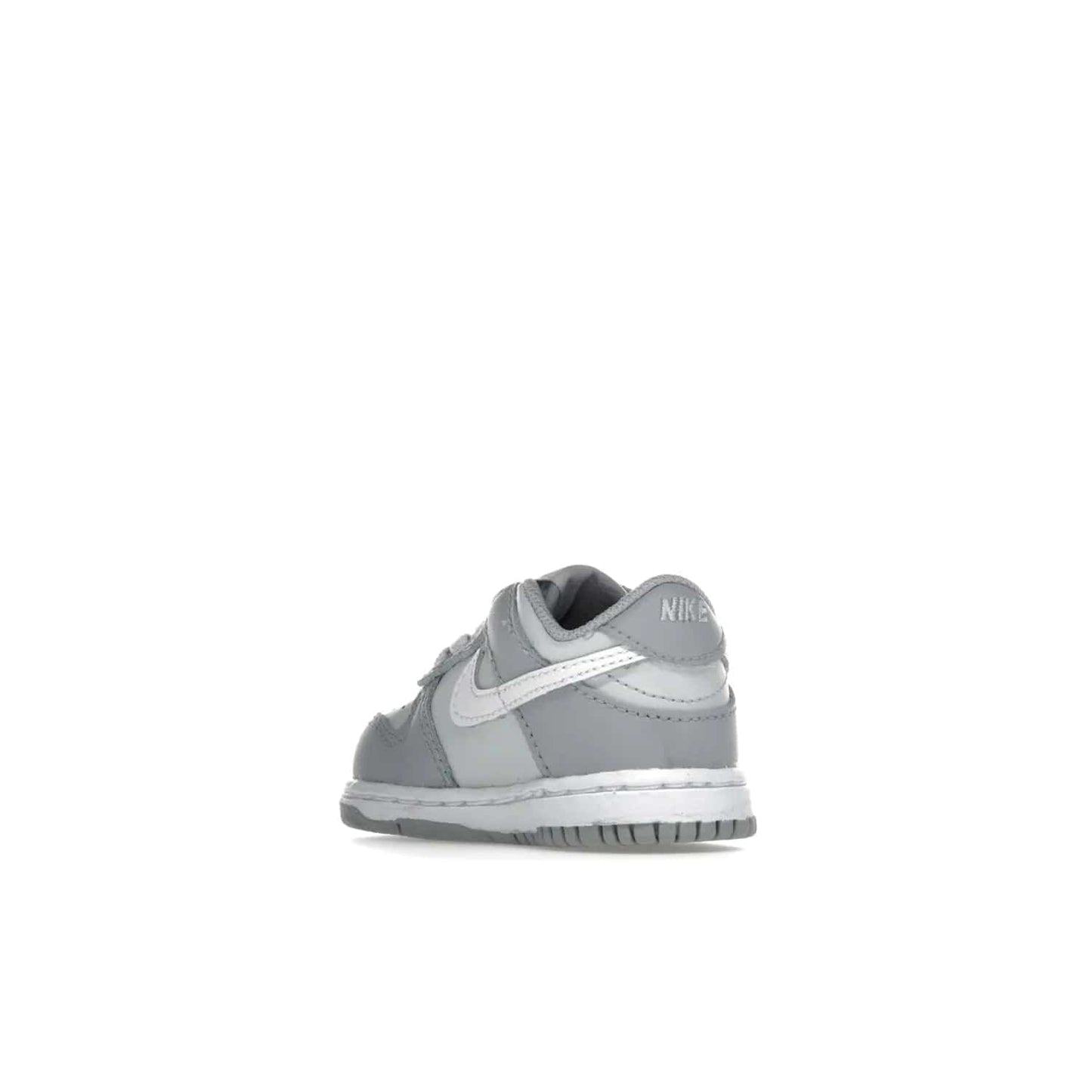Nike Dunk Low Two-Toned Grey (TD) - Image 24 - Only at www.BallersClubKickz.com - Clean and sharp Nike Dunk Low Two-Toned Grey (TD) release on March 1, 2022. Pure Platinum and White-Wolf Grey design with extra-cushioned midsole for optimal comfort and style.