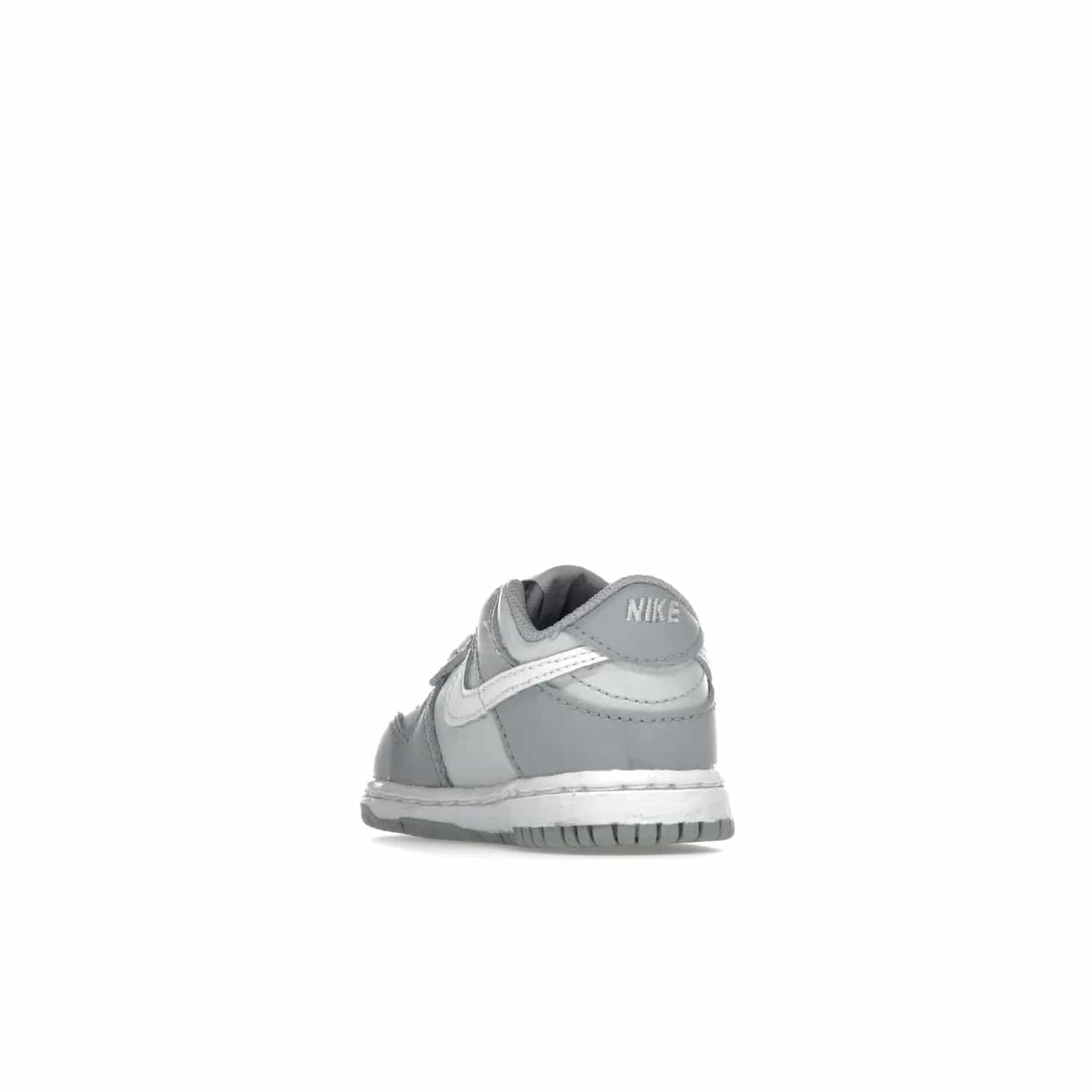 Nike Dunk Low Two-Toned Grey (TD) - Image 25 - Only at www.BallersClubKickz.com - Clean and sharp Nike Dunk Low Two-Toned Grey (TD) release on March 1, 2022. Pure Platinum and White-Wolf Grey design with extra-cushioned midsole for optimal comfort and style.