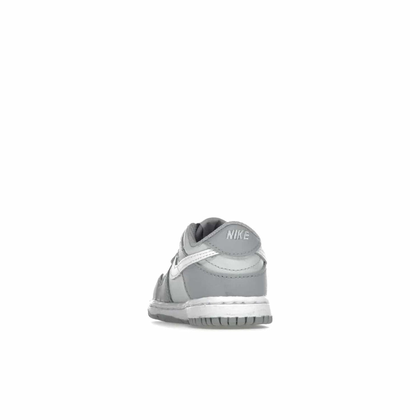 Nike Dunk Low Two-Toned Grey (TD) - Image 26 - Only at www.BallersClubKickz.com - Clean and sharp Nike Dunk Low Two-Toned Grey (TD) release on March 1, 2022. Pure Platinum and White-Wolf Grey design with extra-cushioned midsole for optimal comfort and style.