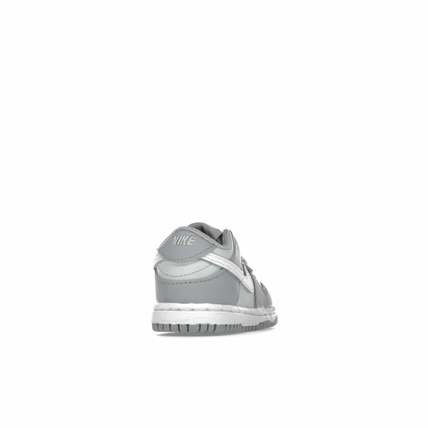 Nike Dunk Low Two-Toned Grey (TD) - Image 30 - Only at www.BallersClubKickz.com - Clean and sharp Nike Dunk Low Two-Toned Grey (TD) release on March 1, 2022. Pure Platinum and White-Wolf Grey design with extra-cushioned midsole for optimal comfort and style.