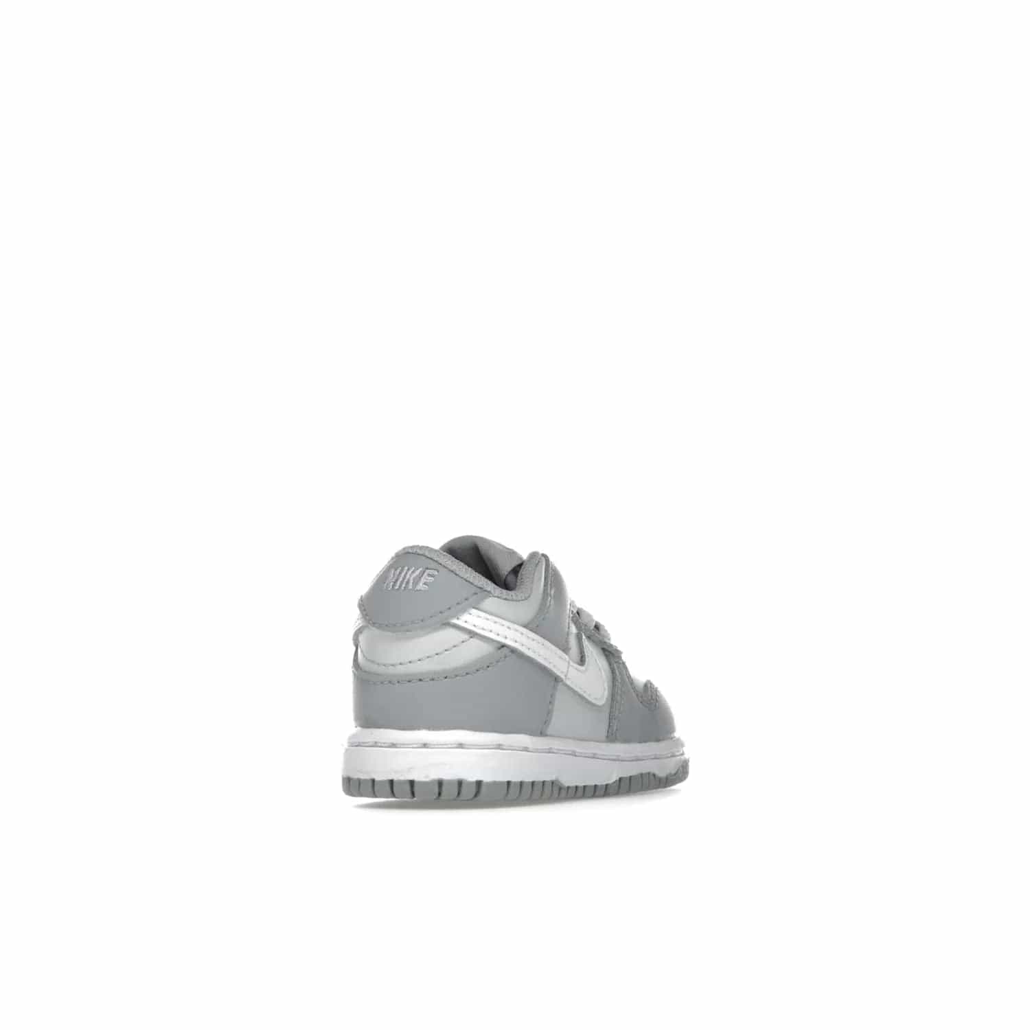 Nike Dunk Low Two-Toned Grey (TD) - Image 31 - Only at www.BallersClubKickz.com - Clean and sharp Nike Dunk Low Two-Toned Grey (TD) release on March 1, 2022. Pure Platinum and White-Wolf Grey design with extra-cushioned midsole for optimal comfort and style.