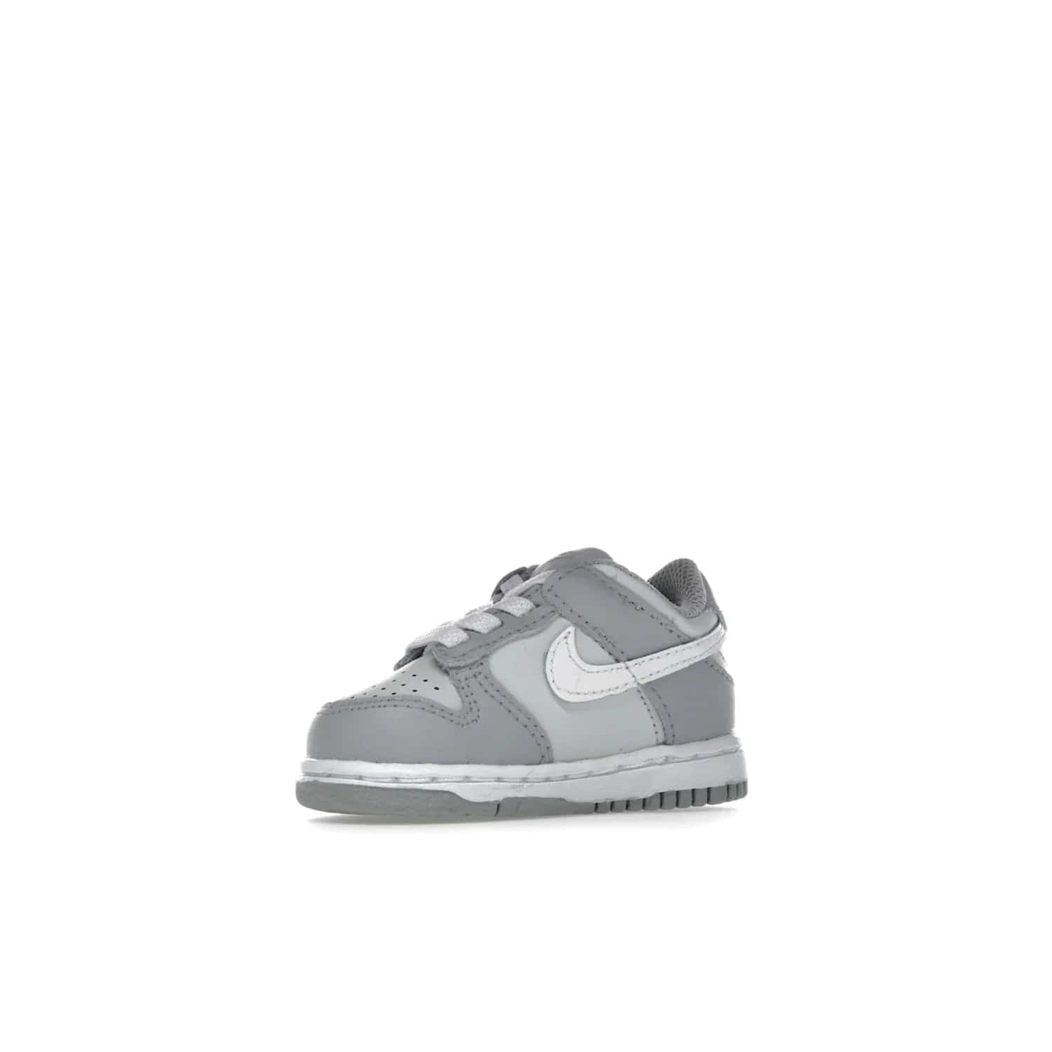 Nike Dunk Low Two-Toned Grey (TD) - Image 16 - Only at www.BallersClubKickz.com - Clean and sharp Nike Dunk Low Two-Toned Grey (TD) release on March 1, 2022. Pure Platinum and White-Wolf Grey design with extra-cushioned midsole for optimal comfort and style.