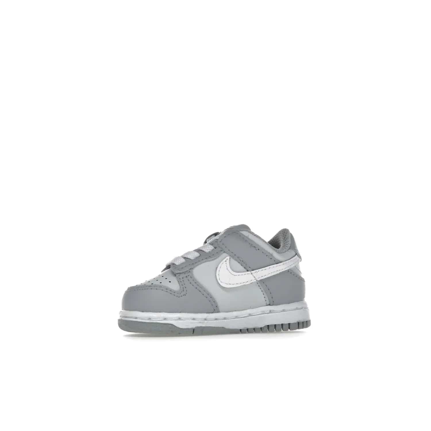 Nike Dunk Low Two-Toned Grey (TD) - Image 17 - Only at www.BallersClubKickz.com - Clean and sharp Nike Dunk Low Two-Toned Grey (TD) release on March 1, 2022. Pure Platinum and White-Wolf Grey design with extra-cushioned midsole for optimal comfort and style.