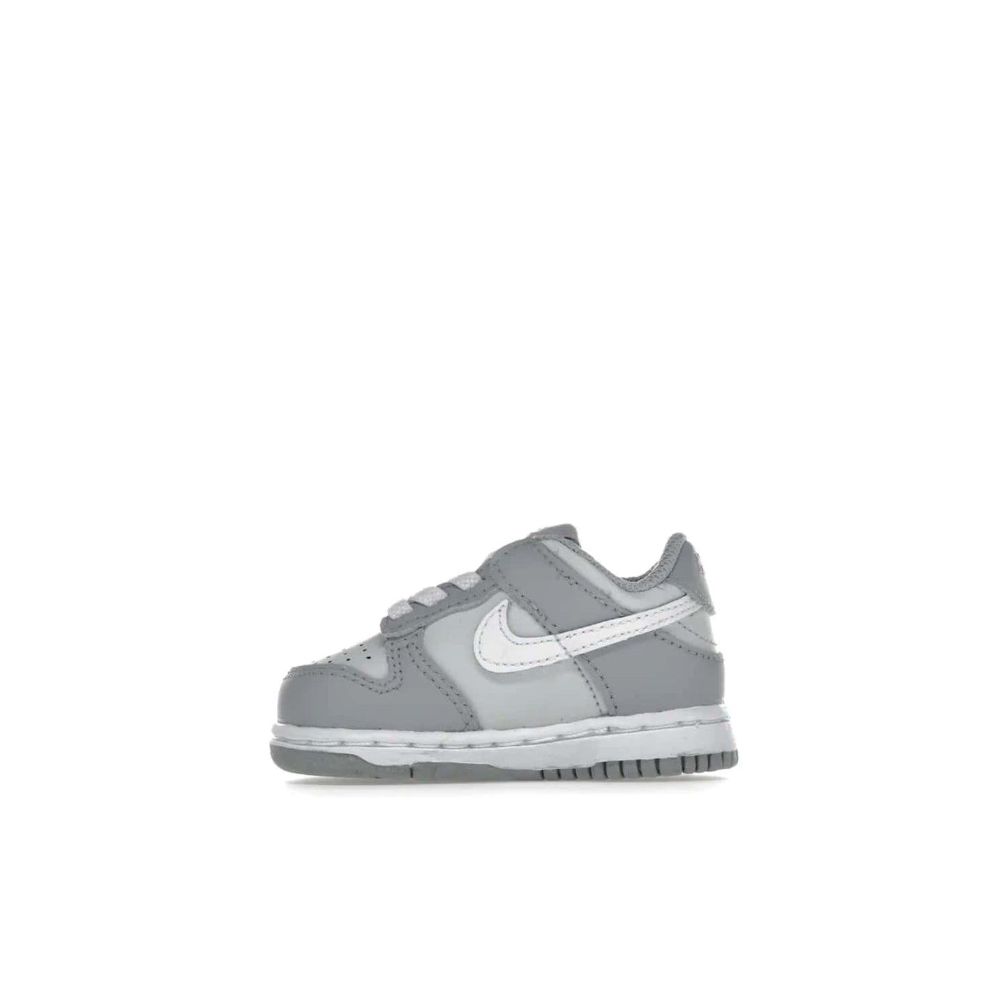 Nike Dunk Low Two-Toned Grey (TD) - Image 19 - Only at www.BallersClubKickz.com - Clean and sharp Nike Dunk Low Two-Toned Grey (TD) release on March 1, 2022. Pure Platinum and White-Wolf Grey design with extra-cushioned midsole for optimal comfort and style.