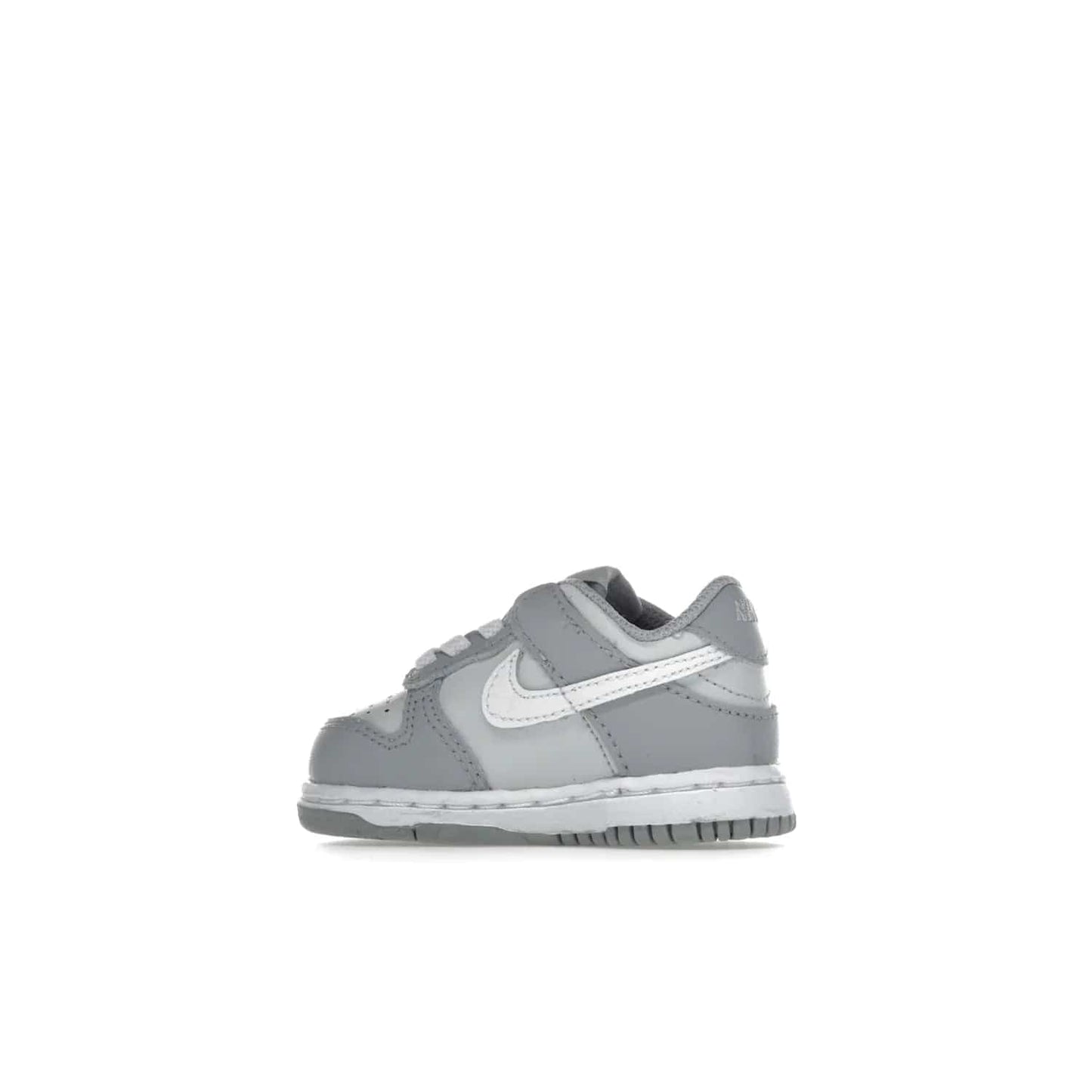 Nike Dunk Low Two-Toned Grey (TD) - Image 21 - Only at www.BallersClubKickz.com - Clean and sharp Nike Dunk Low Two-Toned Grey (TD) release on March 1, 2022. Pure Platinum and White-Wolf Grey design with extra-cushioned midsole for optimal comfort and style.