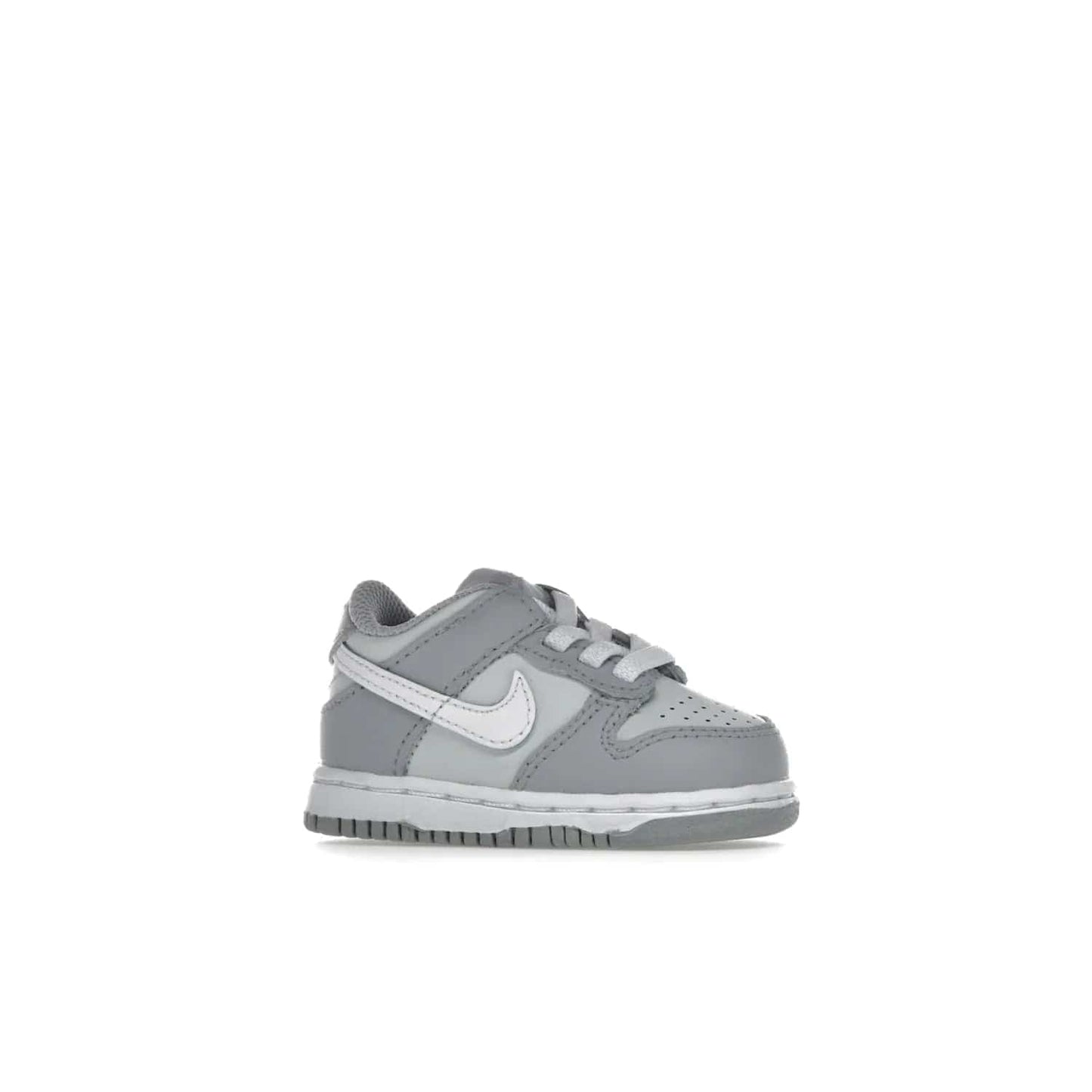 Nike Dunk Low Two-Toned Grey (TD) - Image 3 - Only at www.BallersClubKickz.com - Clean and sharp Nike Dunk Low Two-Toned Grey (TD) release on March 1, 2022. Pure Platinum and White-Wolf Grey design with extra-cushioned midsole for optimal comfort and style.