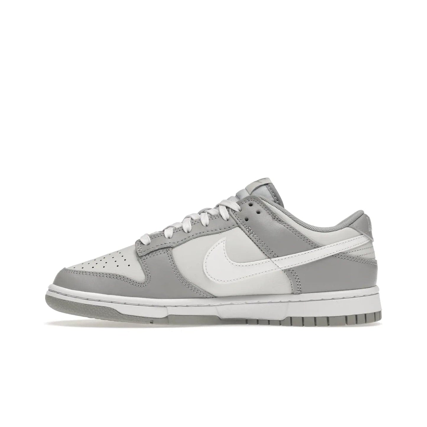 Nike Dunk Low Two Tone Grey - Image 19 - Only at www.BallersClubKickz.com - Fresh Nike Dunk Low Two Tone Grey leather/overlay Sneaker. White Swoosh detailing, nylon tongue, woven label and Air Sole. Get yours and stay on the trend.