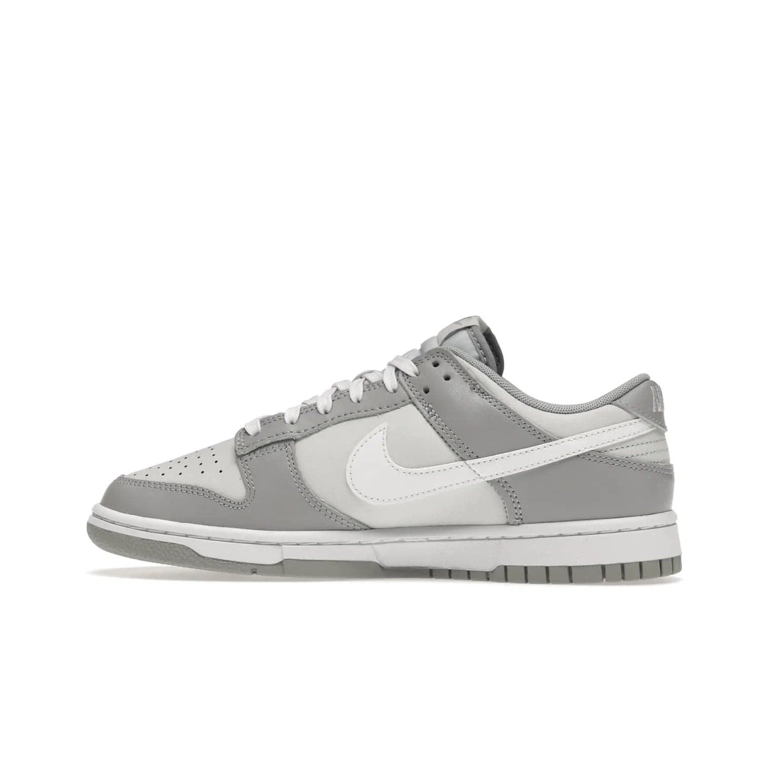 Nike Dunk Low Two Tone Grey - Image 20 - Only at www.BallersClubKickz.com - Fresh Nike Dunk Low Two Tone Grey leather/overlay Sneaker. White Swoosh detailing, nylon tongue, woven label and Air Sole. Get yours and stay on the trend.
