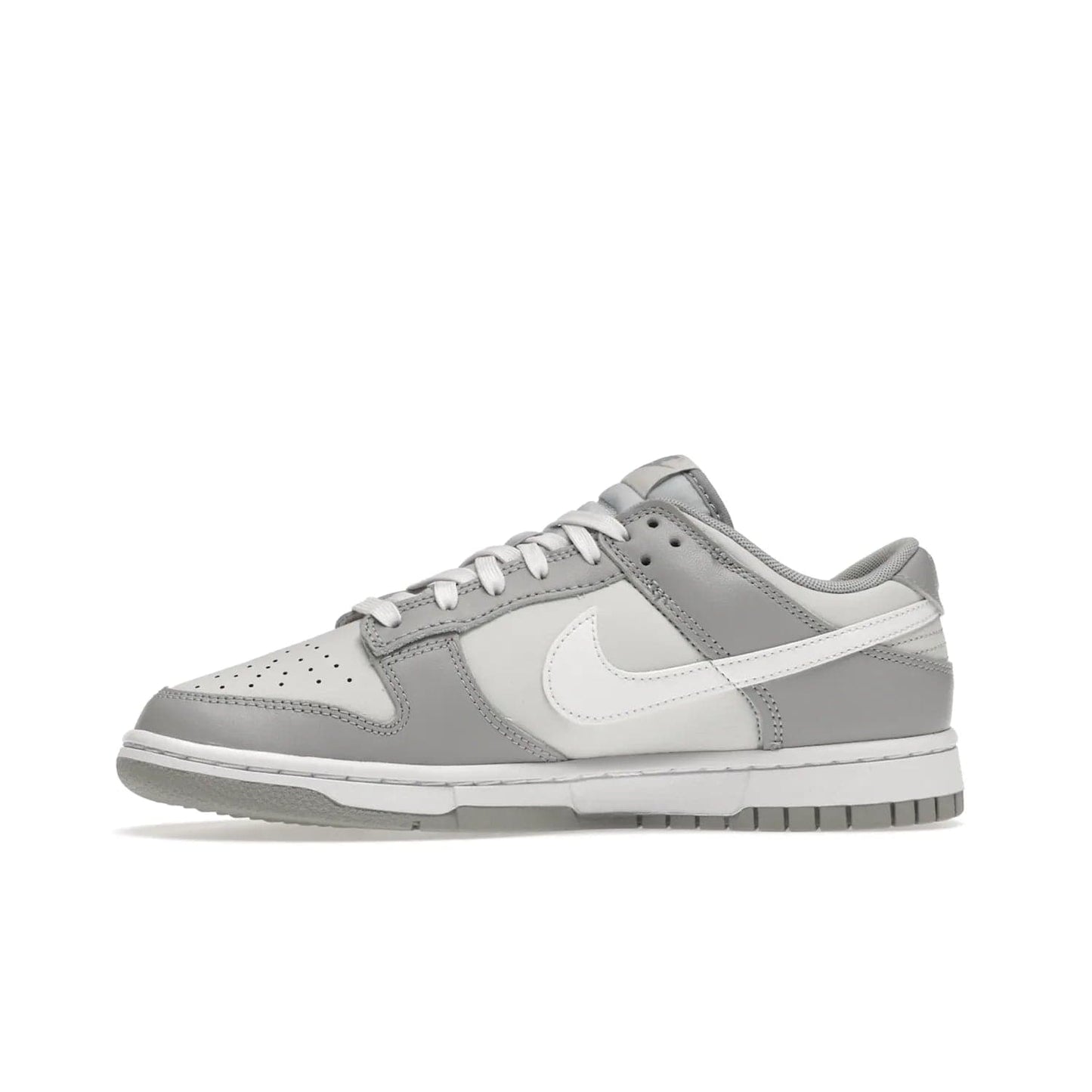 Nike Dunk Low Two Tone Grey - Image 18 - Only at www.BallersClubKickz.com - Fresh Nike Dunk Low Two Tone Grey leather/overlay Sneaker. White Swoosh detailing, nylon tongue, woven label and Air Sole. Get yours and stay on the trend.