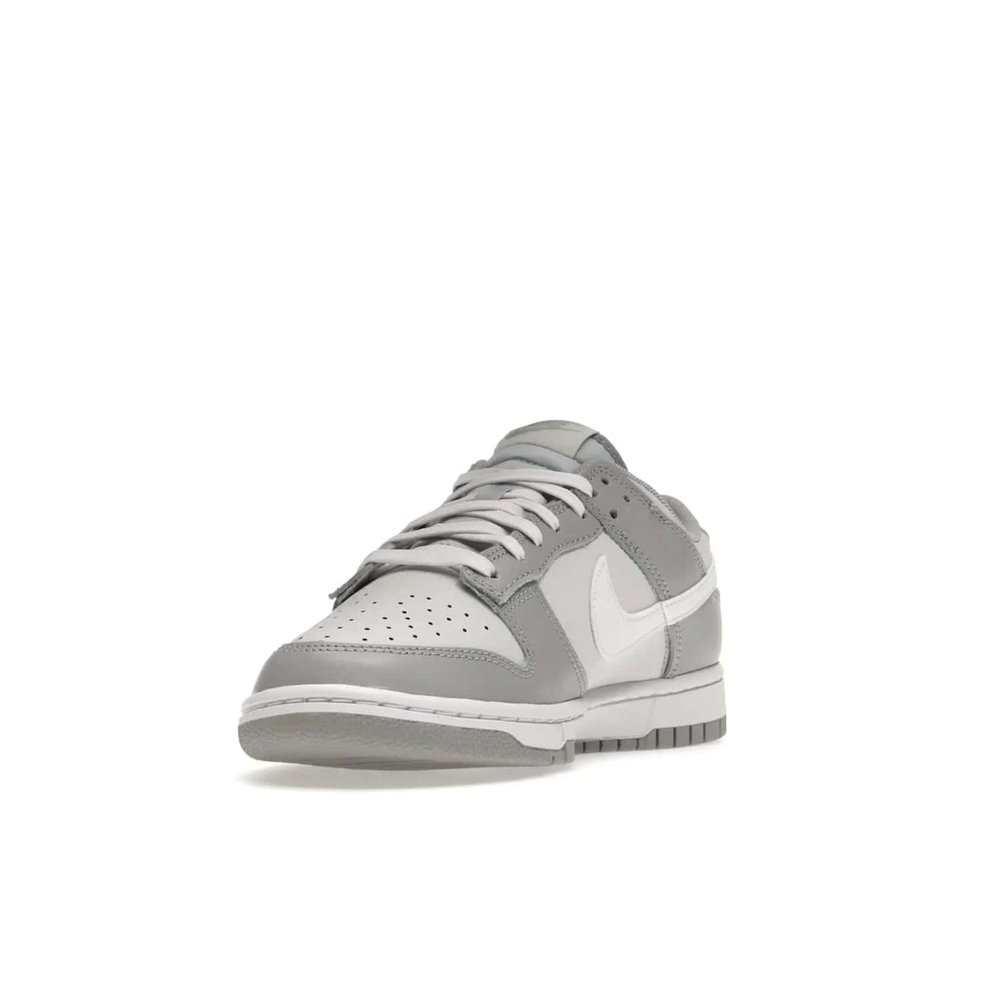 Nike Dunk Low Two Tone Grey - Image 13 - Only at www.BallersClubKickz.com - Fresh Nike Dunk Low Two Tone Grey leather/overlay Sneaker. White Swoosh detailing, nylon tongue, woven label and Air Sole. Get yours and stay on the trend.