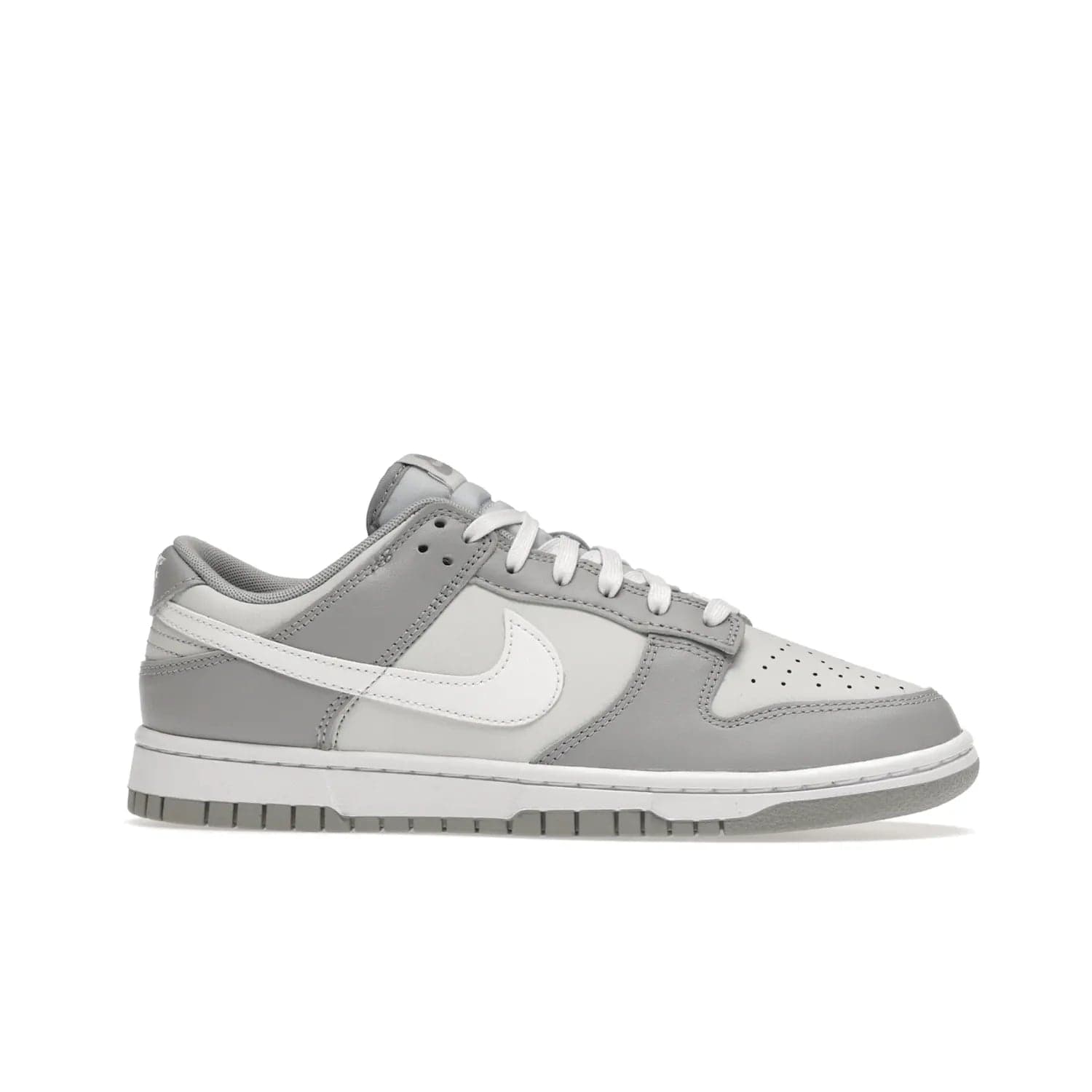 Nike Dunk Low Two Tone Grey - Image 2 - Only at www.BallersClubKickz.com - Fresh Nike Dunk Low Two Tone Grey leather/overlay Sneaker. White Swoosh detailing, nylon tongue, woven label and Air Sole. Get yours and stay on the trend.