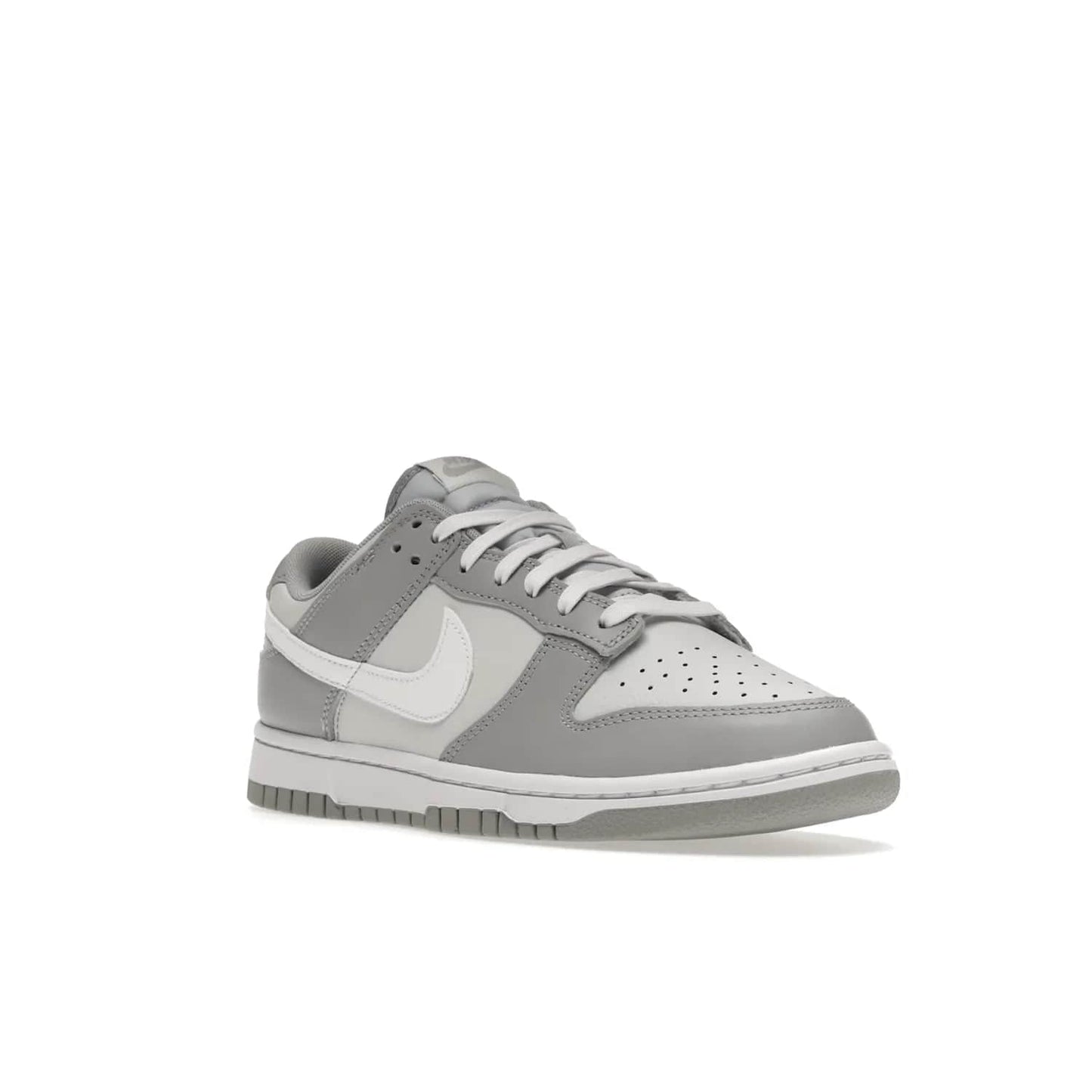 Nike Dunk Low Two Tone Grey - Image 6 - Only at www.BallersClubKickz.com - Fresh Nike Dunk Low Two Tone Grey leather/overlay Sneaker. White Swoosh detailing, nylon tongue, woven label and Air Sole. Get yours and stay on the trend.