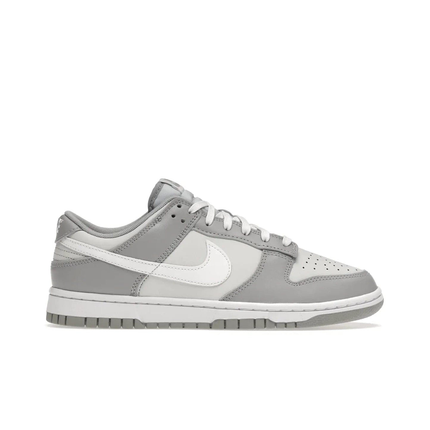 Nike Dunk Low Two Tone Grey - Image 1 - Only at www.BallersClubKickz.com - Fresh Nike Dunk Low Two Tone Grey leather/overlay Sneaker. White Swoosh detailing, nylon tongue, woven label and Air Sole. Get yours and stay on the trend.