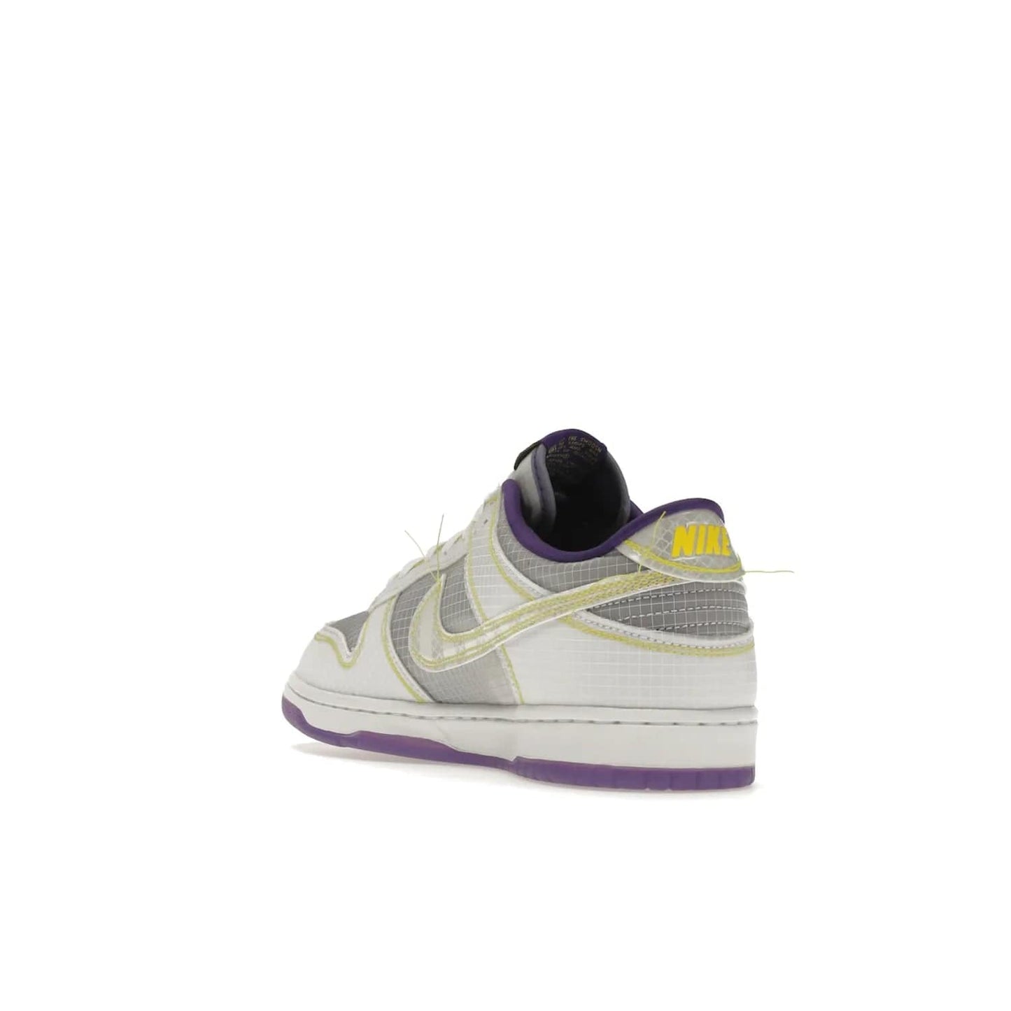 Nike Dunk Low Union Passport Pack Court Purple - Image 25 - Only at www.BallersClubKickz.com - Nike Dunk Low Union LA Passport Pack Court Purple features Court Purple and white smooth leather construction and Union LA Frontman logo on the heel. Releasing in April of 2022, this iconic shoe will make a splash in the streetwear world.
