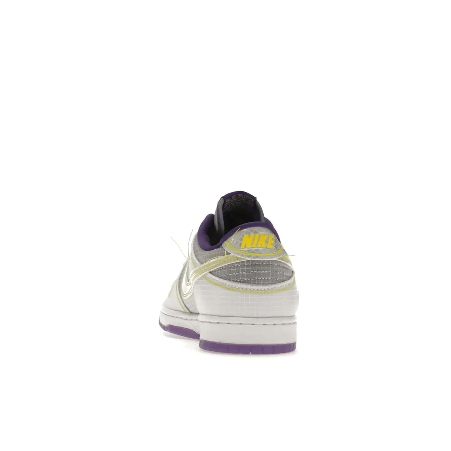 Nike Dunk Low Union Passport Pack Court Purple - Image 27 - Only at www.BallersClubKickz.com - Nike Dunk Low Union LA Passport Pack Court Purple features Court Purple and white smooth leather construction and Union LA Frontman logo on the heel. Releasing in April of 2022, this iconic shoe will make a splash in the streetwear world.