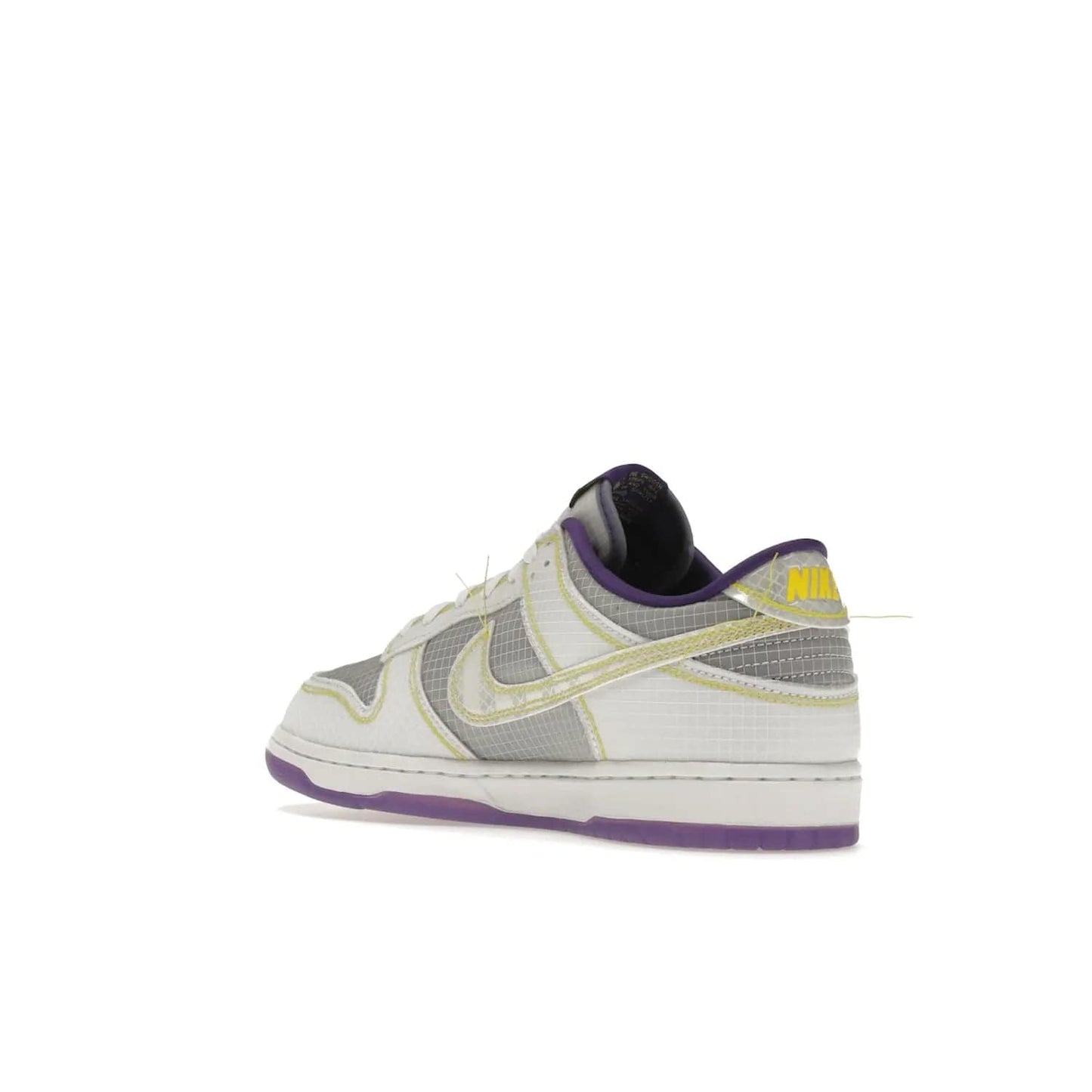 Nike Dunk Low Union Passport Pack Court Purple - Image 24 - Only at www.BallersClubKickz.com - Nike Dunk Low Union LA Passport Pack Court Purple features Court Purple and white smooth leather construction and Union LA Frontman logo on the heel. Releasing in April of 2022, this iconic shoe will make a splash in the streetwear world.