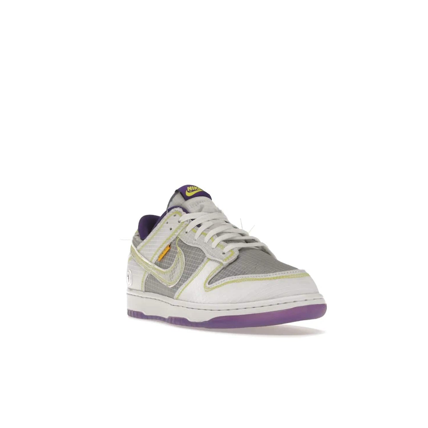 Nike Dunk Low Union Passport Pack Court Purple - Image 7 - Only at www.BallersClubKickz.com - Nike Dunk Low Union LA Passport Pack Court Purple features Court Purple and white smooth leather construction and Union LA Frontman logo on the heel. Releasing in April of 2022, this iconic shoe will make a splash in the streetwear world.