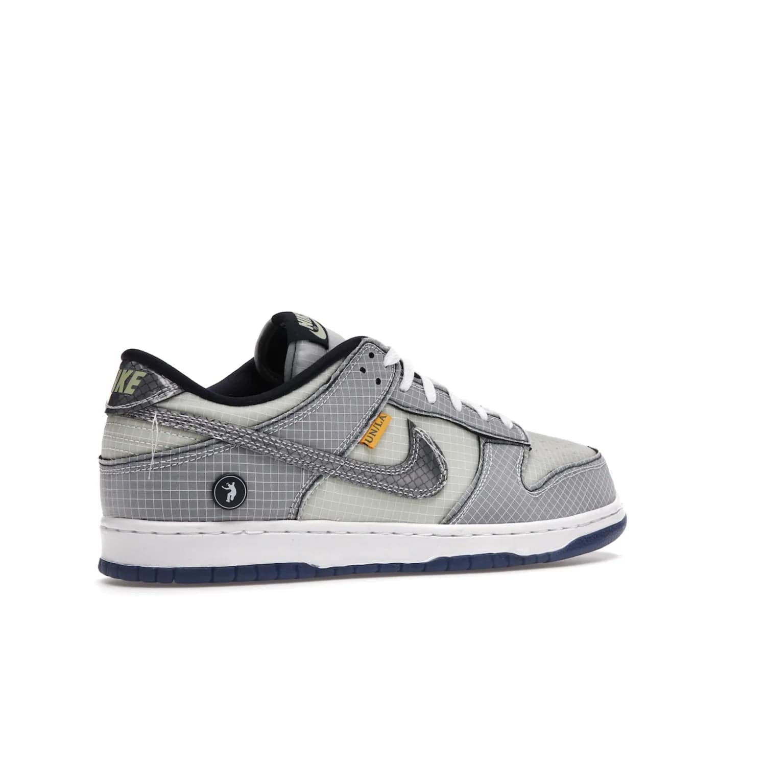 Nike Dunk Low Union Passport Pack Pistachio - Image 34 - Only at www.BallersClubKickz.com - Shop the Nike Dunk Low Union Passport Pack Pistachio! This statement-making silhouette combines light green and navy leather with a semi-translucent ripstop nylon. Comes with exclusive Walter Lee Young-inspired emblem at the heel and a yellow Union LA tab on the quarter panel. Releasing February 2022.