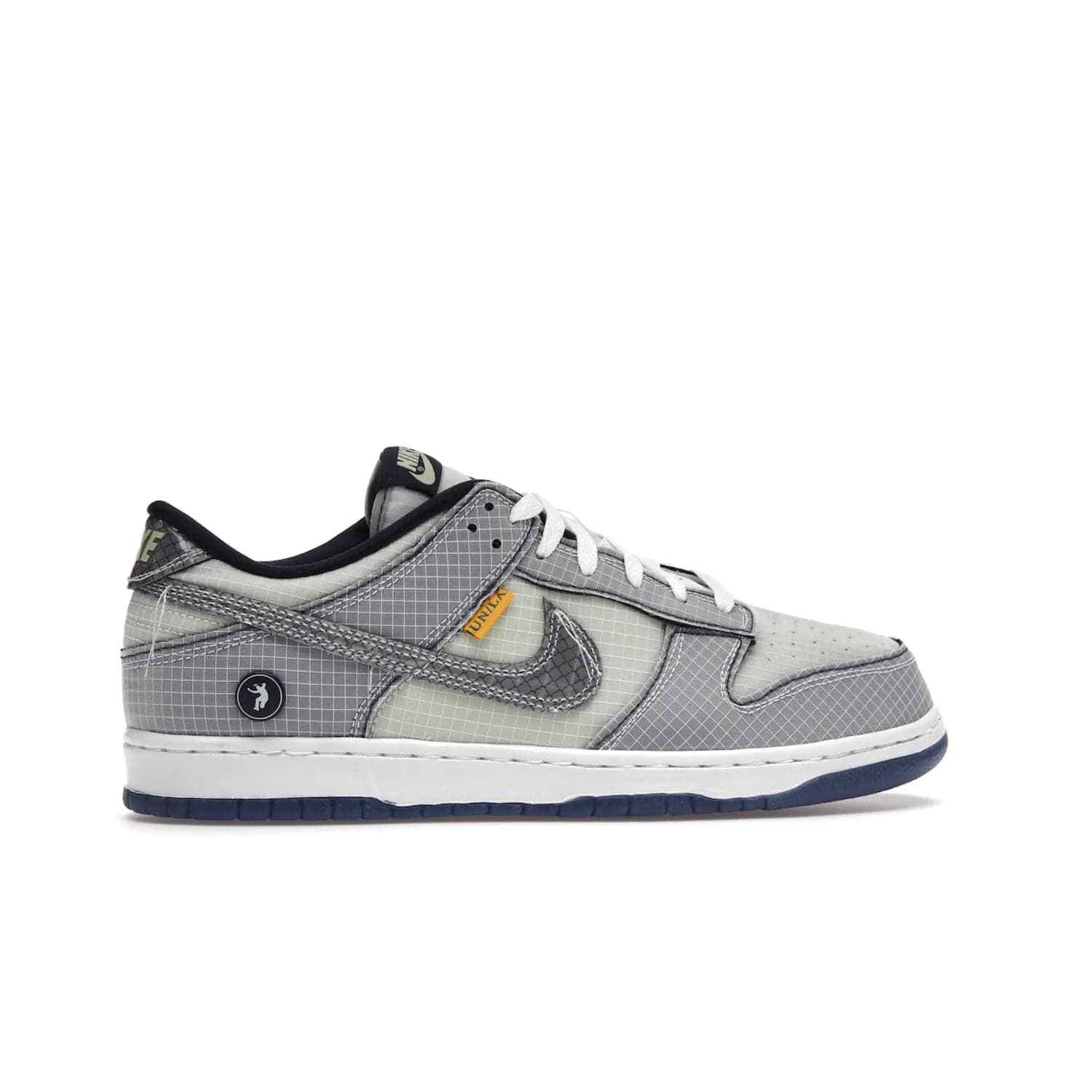 Nike Dunk Low Union Passport Pack Pistachio - Image 36 - Only at www.BallersClubKickz.com - Shop the Nike Dunk Low Union Passport Pack Pistachio! This statement-making silhouette combines light green and navy leather with a semi-translucent ripstop nylon. Comes with exclusive Walter Lee Young-inspired emblem at the heel and a yellow Union LA tab on the quarter panel. Releasing February 2022.