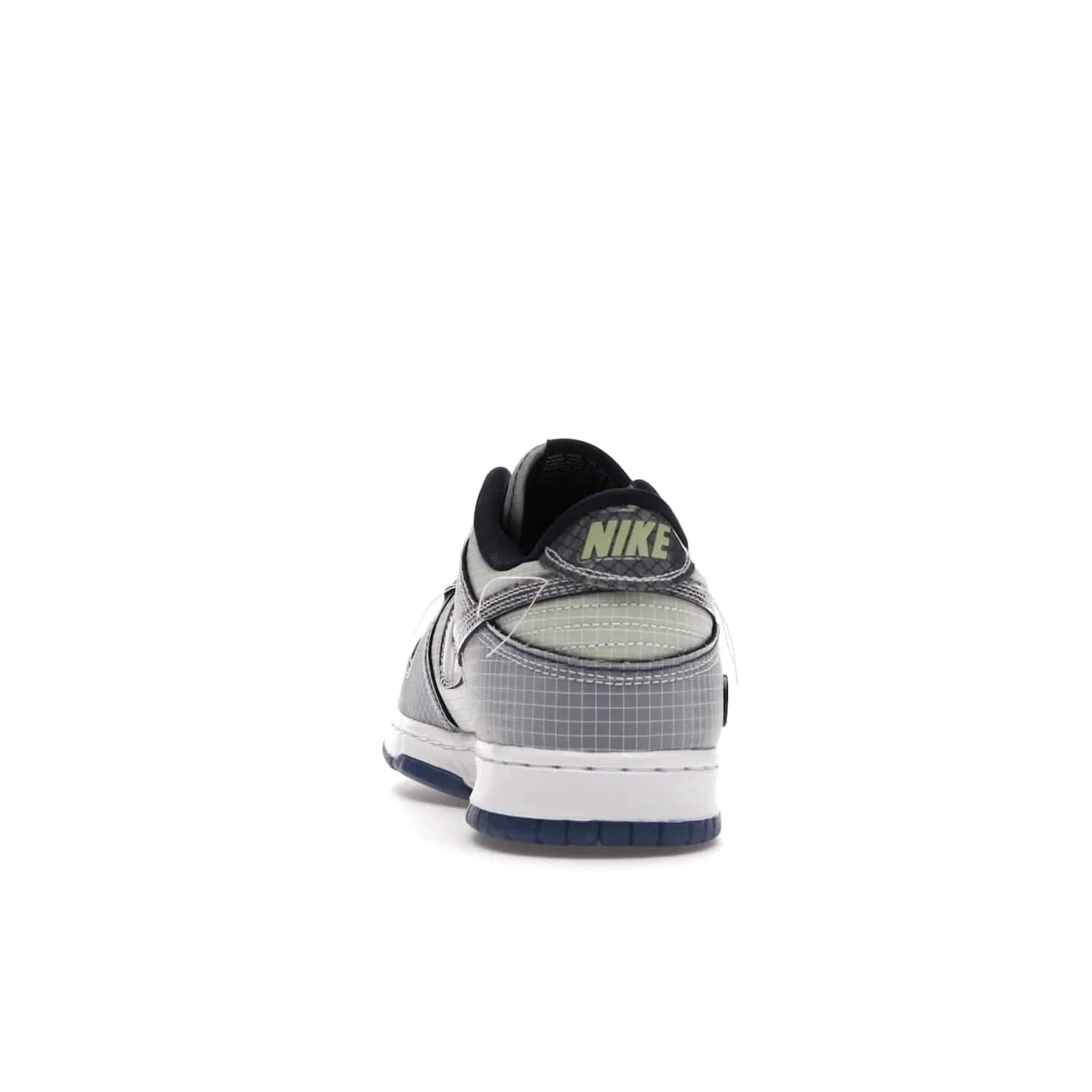 Nike Dunk Low Union Passport Pack Pistachio - Image 27 - Only at www.BallersClubKickz.com - Shop the Nike Dunk Low Union Passport Pack Pistachio! This statement-making silhouette combines light green and navy leather with a semi-translucent ripstop nylon. Comes with exclusive Walter Lee Young-inspired emblem at the heel and a yellow Union LA tab on the quarter panel. Releasing February 2022.
