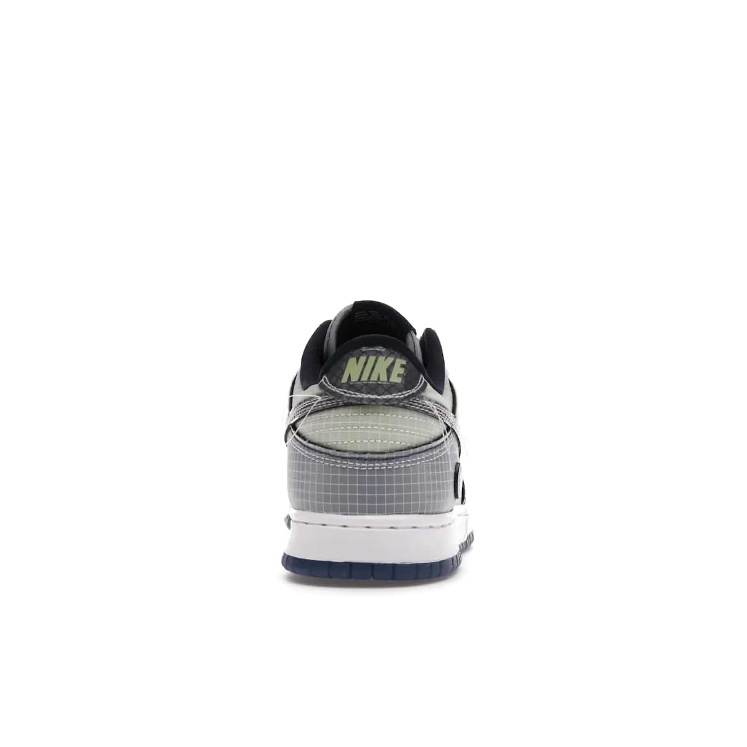 Nike Dunk Low Union Passport Pack Pistachio - Image 28 - Only at www.BallersClubKickz.com - Shop the Nike Dunk Low Union Passport Pack Pistachio! This statement-making silhouette combines light green and navy leather with a semi-translucent ripstop nylon. Comes with exclusive Walter Lee Young-inspired emblem at the heel and a yellow Union LA tab on the quarter panel. Releasing February 2022.