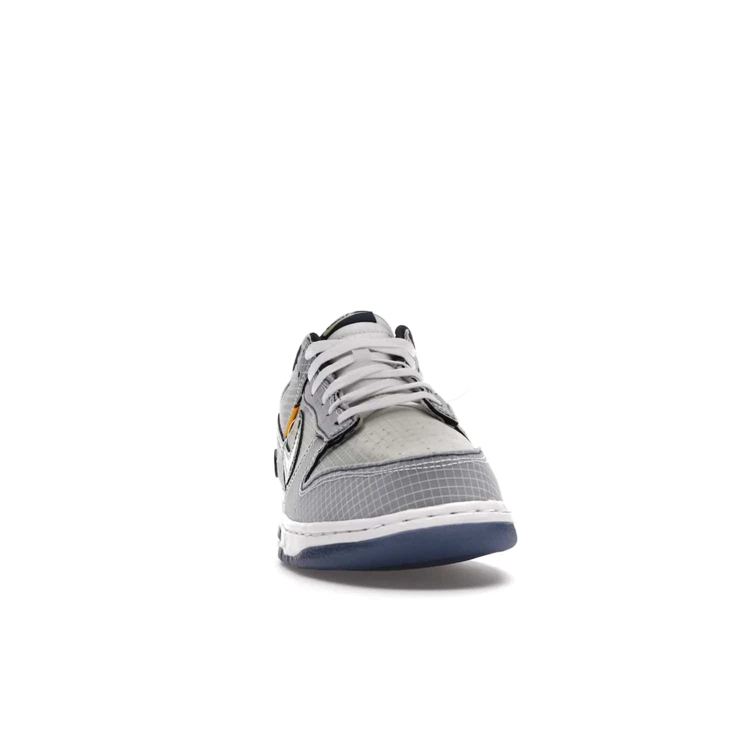 Nike Dunk Low Union Passport Pack Pistachio - Image 9 - Only at www.BallersClubKickz.com - Shop the Nike Dunk Low Union Passport Pack Pistachio! This statement-making silhouette combines light green and navy leather with a semi-translucent ripstop nylon. Comes with exclusive Walter Lee Young-inspired emblem at the heel and a yellow Union LA tab on the quarter panel. Releasing February 2022.
