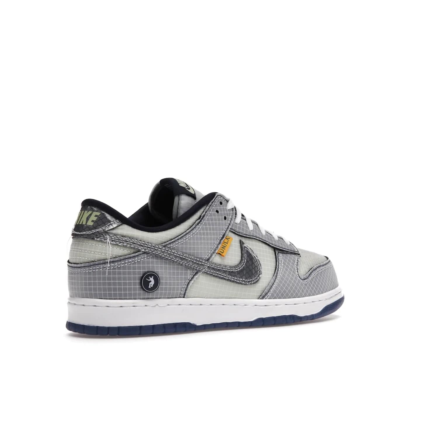 Nike Dunk Low Union Passport Pack Pistachio - Image 33 - Only at www.BallersClubKickz.com - Shop the Nike Dunk Low Union Passport Pack Pistachio! This statement-making silhouette combines light green and navy leather with a semi-translucent ripstop nylon. Comes with exclusive Walter Lee Young-inspired emblem at the heel and a yellow Union LA tab on the quarter panel. Releasing February 2022.