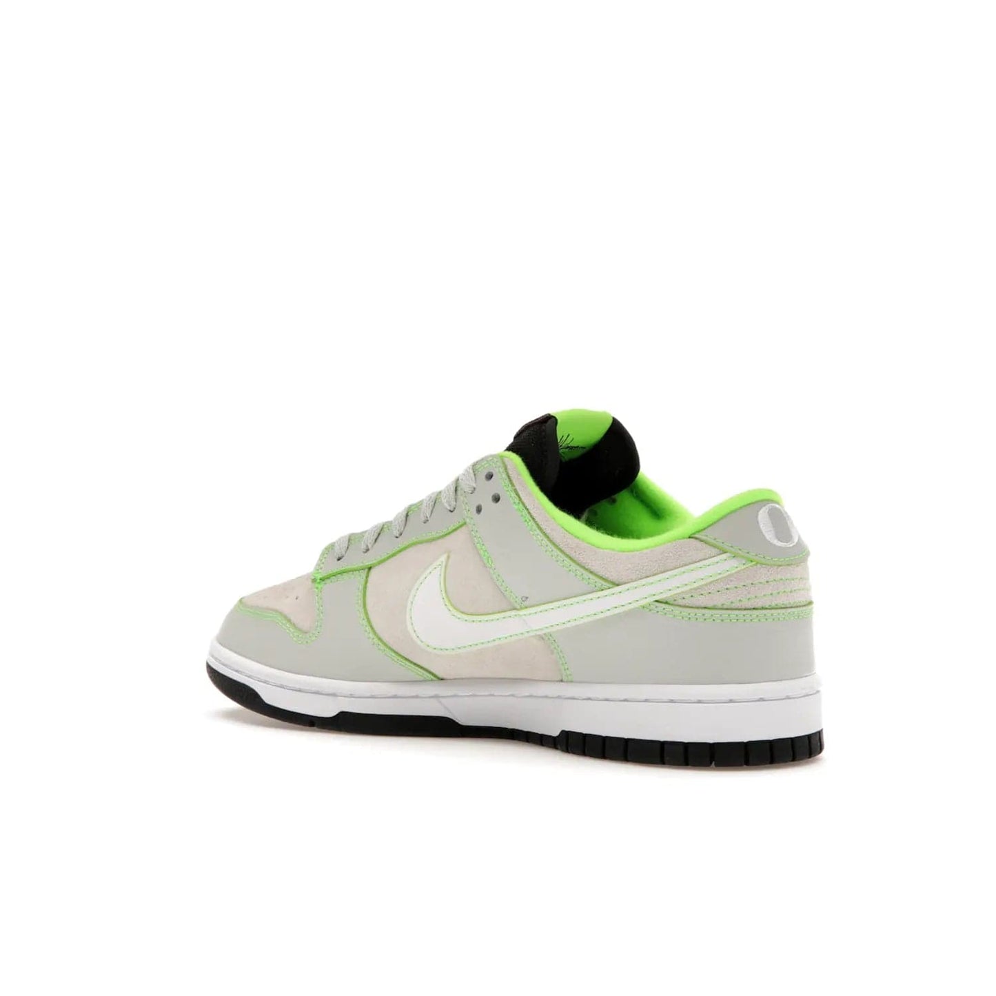 Nike Dunk Low University of Oregon PE (2023) - Image 23 - Only at www.BallersClubKickz.com - Sleek Light Silver and White upper, complemented by Black and Electric Green accents. Nike Dunk Low University of Oregon PE, set to be released April 2023. Must-have for any serious fan.