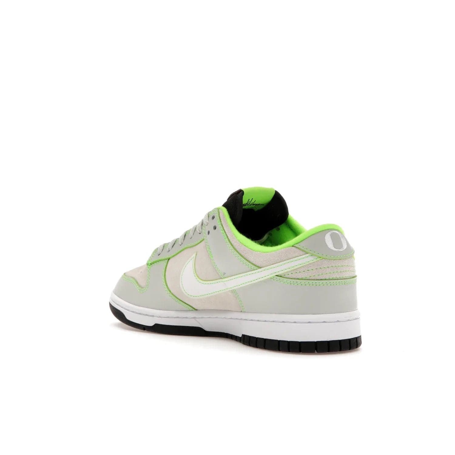 Nike Dunk Low University of Oregon PE (2023) - Image 24 - Only at www.BallersClubKickz.com - Sleek Light Silver and White upper, complemented by Black and Electric Green accents. Nike Dunk Low University of Oregon PE, set to be released April 2023. Must-have for any serious fan.