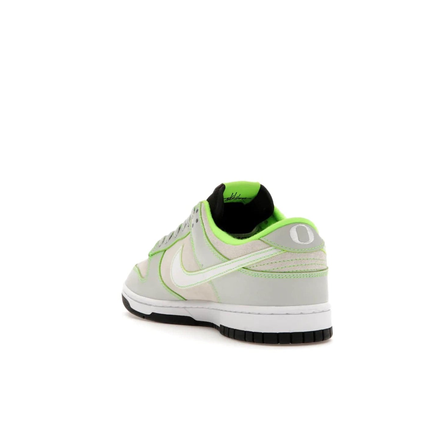 Nike Dunk Low University of Oregon PE (2023) - Image 25 - Only at www.BallersClubKickz.com - Sleek Light Silver and White upper, complemented by Black and Electric Green accents. Nike Dunk Low University of Oregon PE, set to be released April 2023. Must-have for any serious fan.