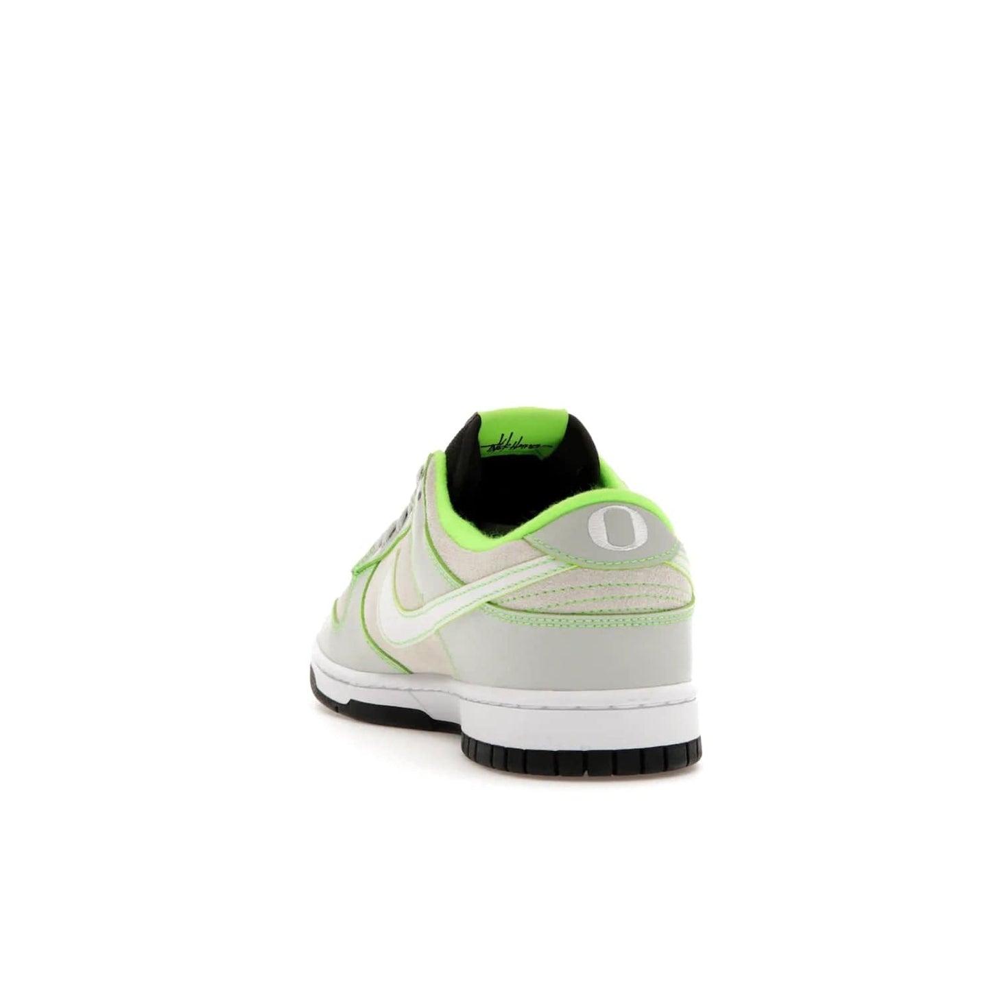 Nike Dunk Low University of Oregon PE (2023) - Image 26 - Only at www.BallersClubKickz.com - Sleek Light Silver and White upper, complemented by Black and Electric Green accents. Nike Dunk Low University of Oregon PE, set to be released April 2023. Must-have for any serious fan.