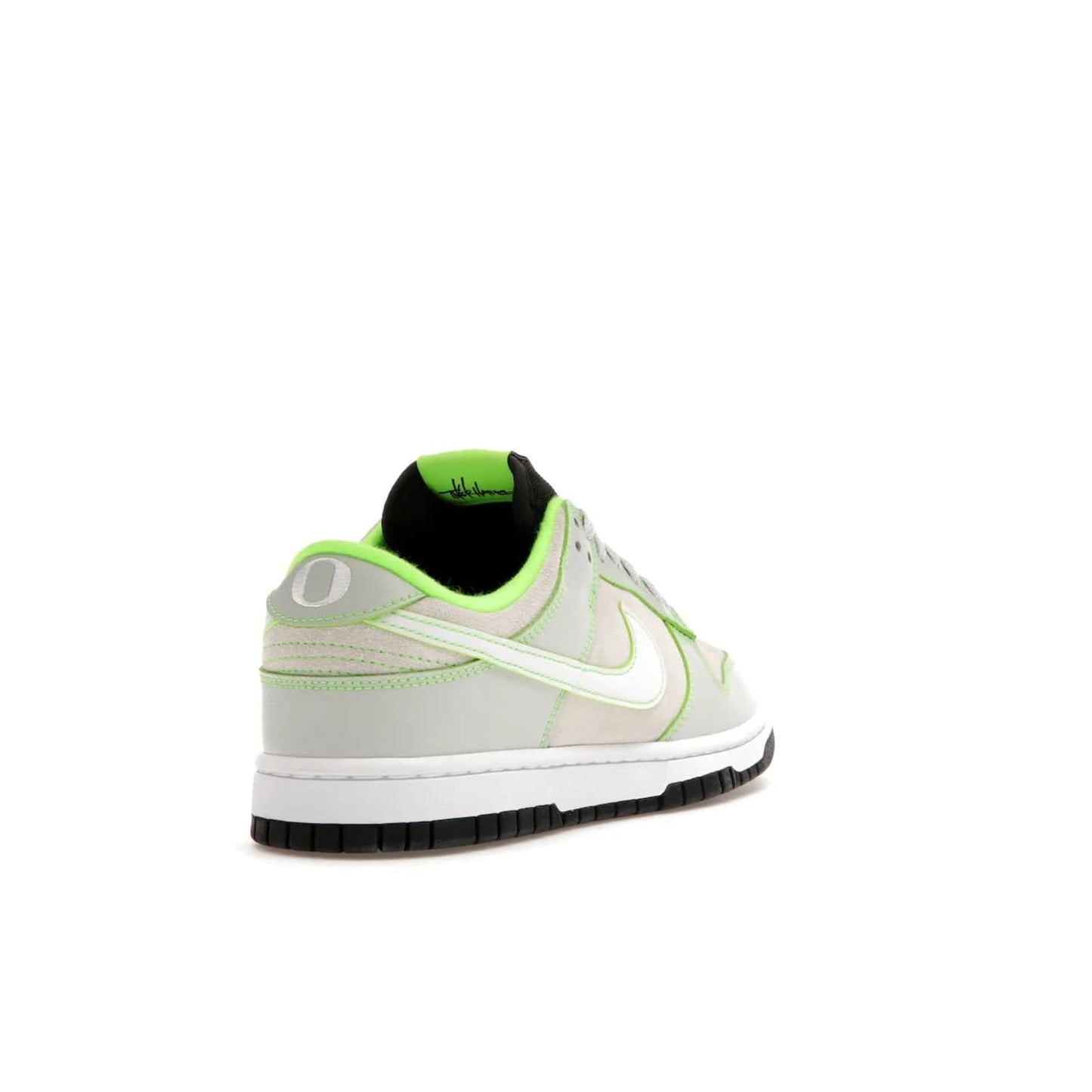 Nike Dunk Low University of Oregon PE (2023) - Image 31 - Only at www.BallersClubKickz.com - Sleek Light Silver and White upper, complemented by Black and Electric Green accents. Nike Dunk Low University of Oregon PE, set to be released April 2023. Must-have for any serious fan.