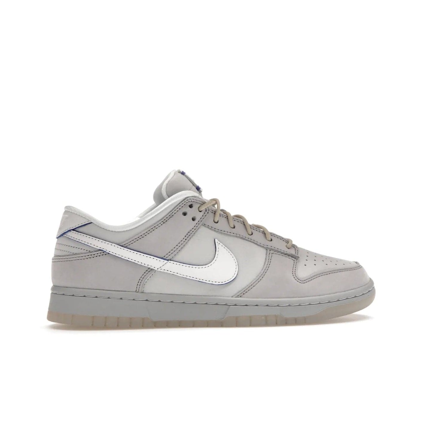 Nike Dunk Low Wolf Grey Pure Platinum - Image 36 - Only at www.BallersClubKickz.com - A timeless classic. The Nike Dunk Low Wolf Grey Pure Platinum combines wolf grey and pure platinum for a unique and eye-catching look. Available on August 15, 2022.