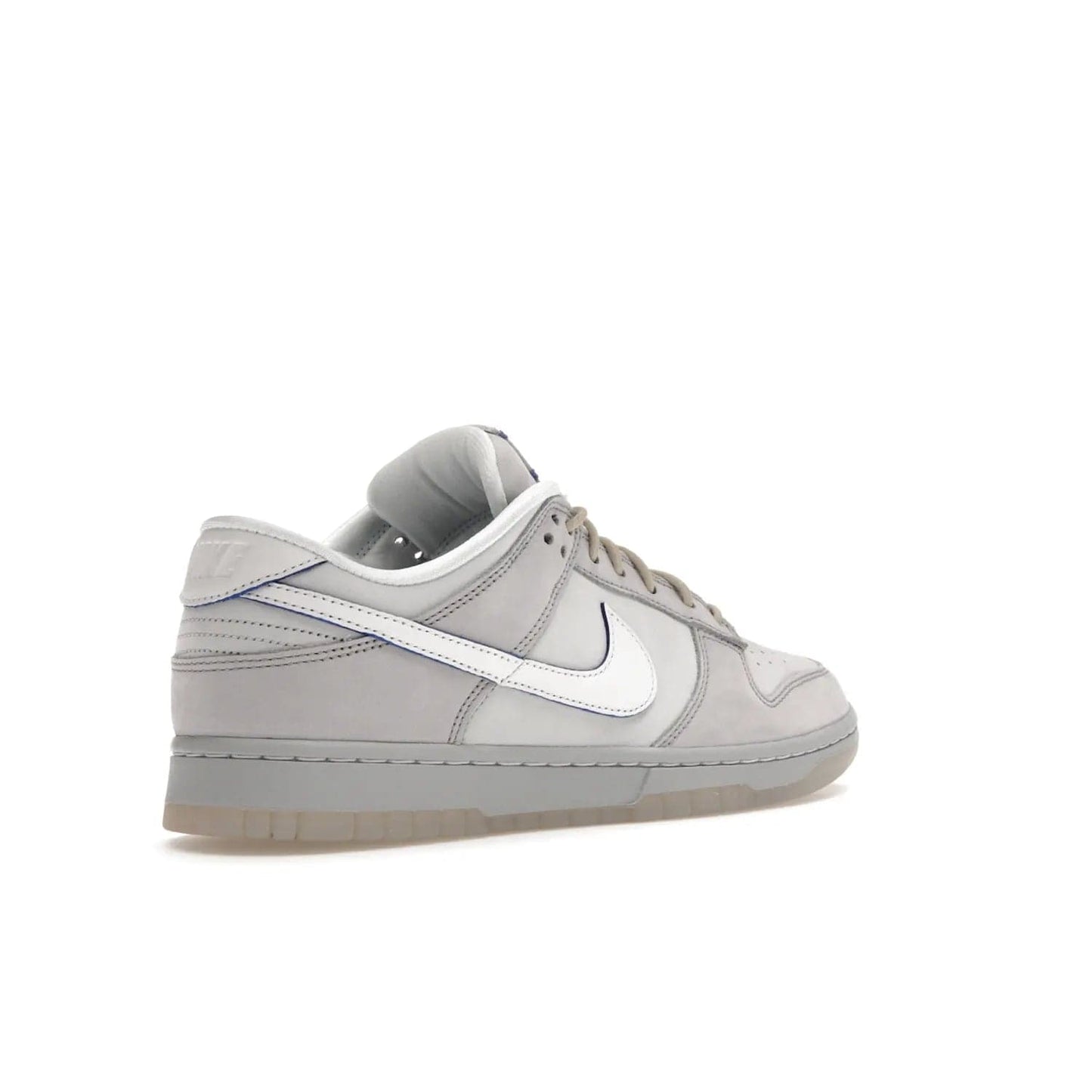 Nike Dunk Low Wolf Grey Pure Platinum - Image 33 - Only at www.BallersClubKickz.com - A timeless classic. The Nike Dunk Low Wolf Grey Pure Platinum combines wolf grey and pure platinum for a unique and eye-catching look. Available on August 15, 2022.