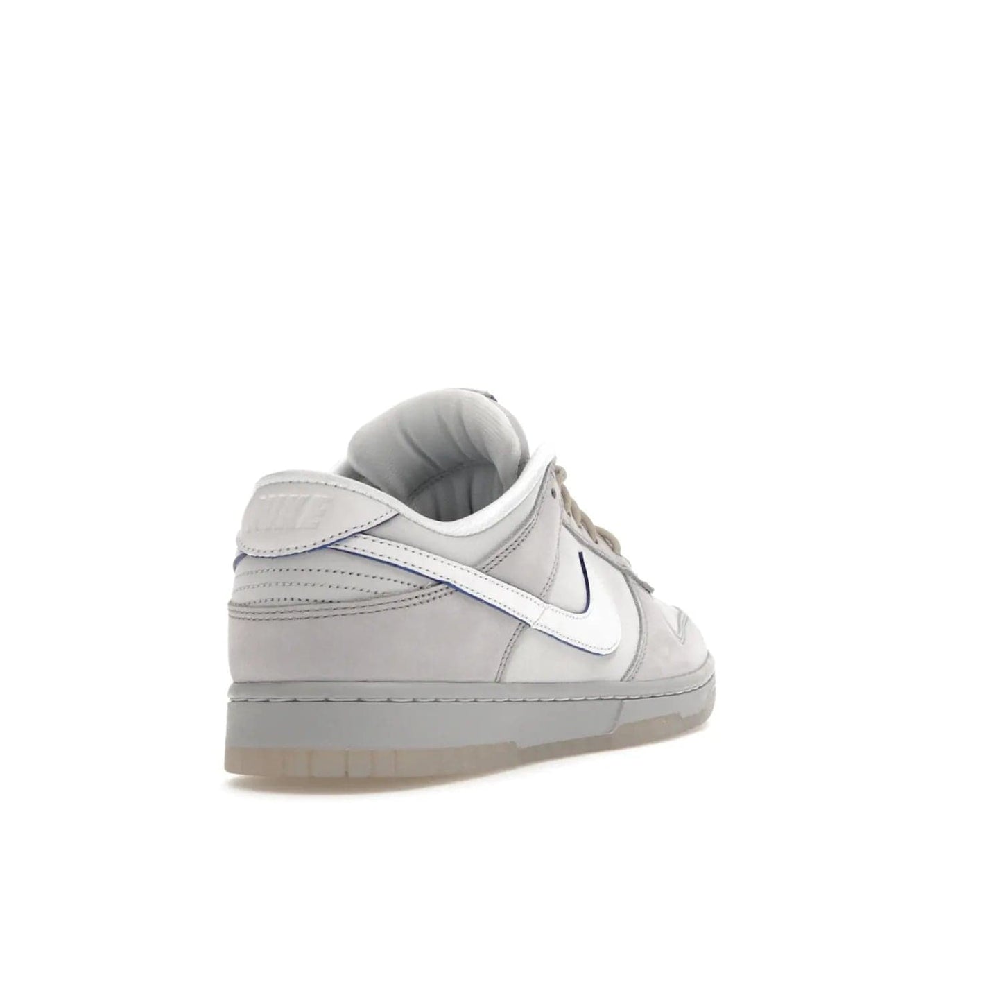 Nike Dunk Low Wolf Grey Pure Platinum - Image 31 - Only at www.BallersClubKickz.com - A timeless classic. The Nike Dunk Low Wolf Grey Pure Platinum combines wolf grey and pure platinum for a unique and eye-catching look. Available on August 15, 2022.