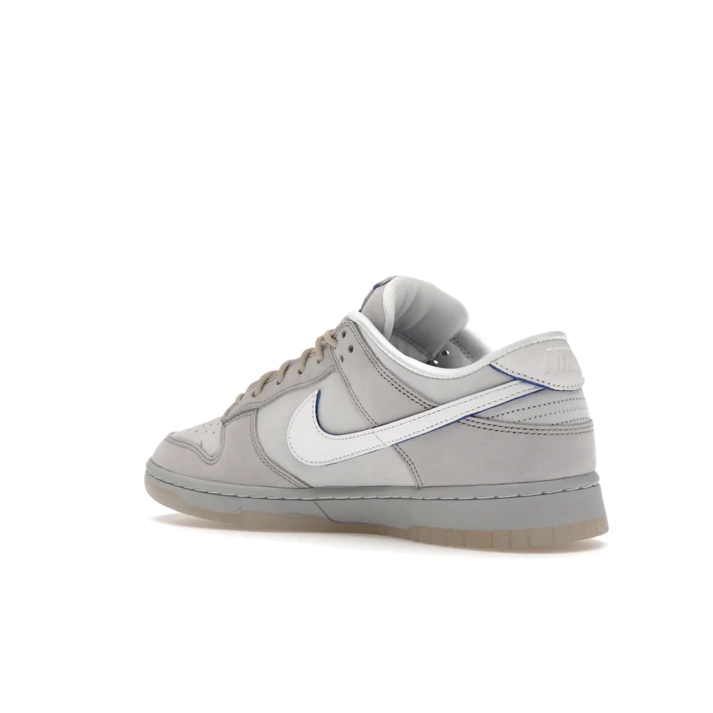 Nike Dunk Low Wolf Grey Pure Platinum - Image 23 - Only at www.BallersClubKickz.com - A timeless classic. The Nike Dunk Low Wolf Grey Pure Platinum combines wolf grey and pure platinum for a unique and eye-catching look. Available on August 15, 2022.