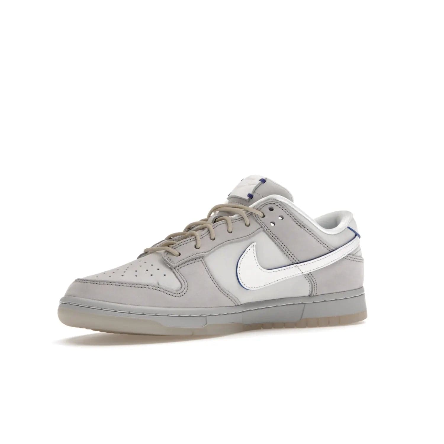 Nike Dunk Low Wolf Grey Pure Platinum - Image 16 - Only at www.BallersClubKickz.com - A timeless classic. The Nike Dunk Low Wolf Grey Pure Platinum combines wolf grey and pure platinum for a unique and eye-catching look. Available on August 15, 2022.