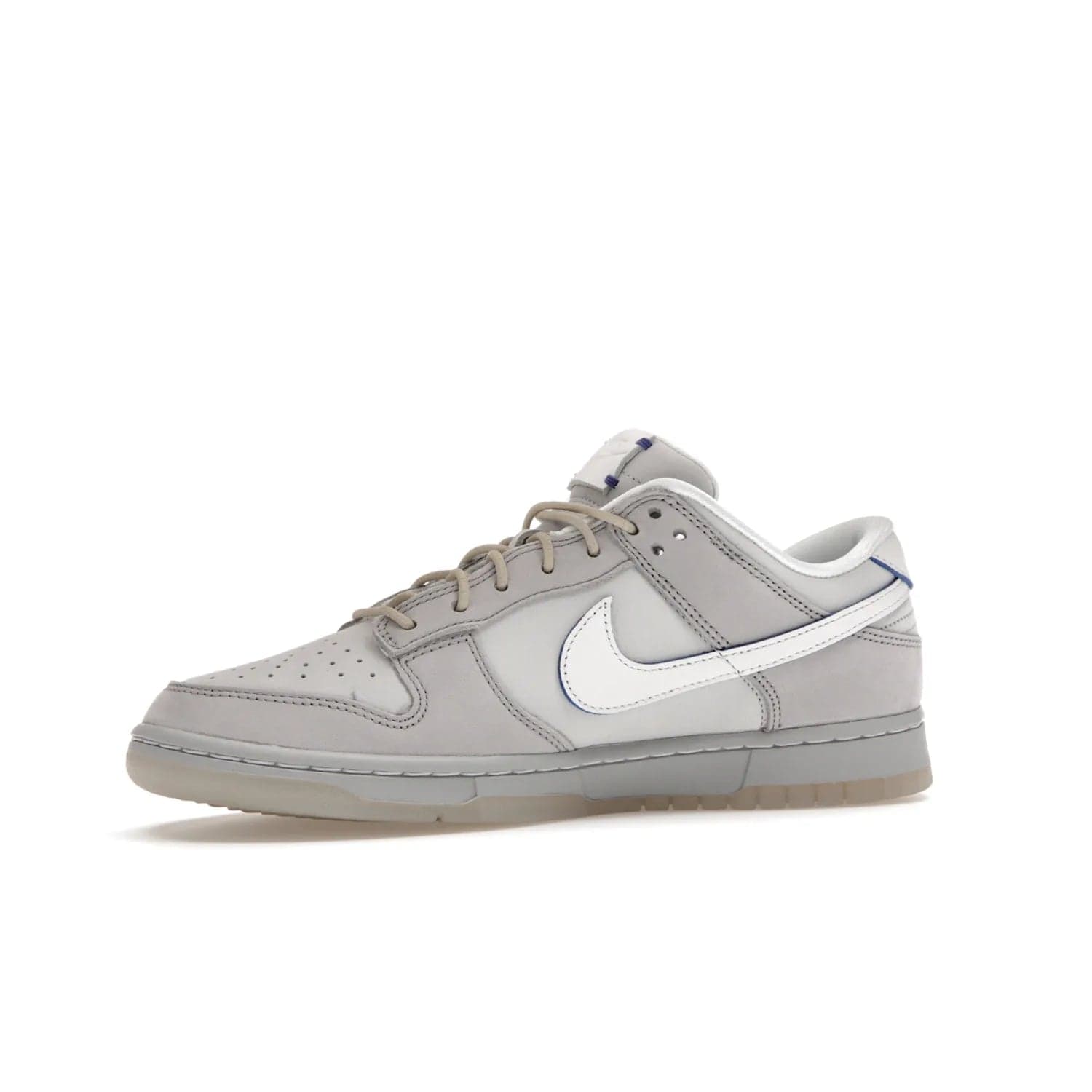 Nike Dunk Low Wolf Grey Pure Platinum - Image 17 - Only at www.BallersClubKickz.com - A timeless classic. The Nike Dunk Low Wolf Grey Pure Platinum combines wolf grey and pure platinum for a unique and eye-catching look. Available on August 15, 2022.
