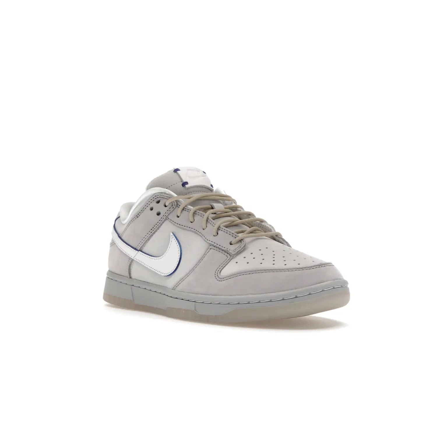 Nike Dunk Low Wolf Grey Pure Platinum - Image 6 - Only at www.BallersClubKickz.com - A timeless classic. The Nike Dunk Low Wolf Grey Pure Platinum combines wolf grey and pure platinum for a unique and eye-catching look. Available on August 15, 2022.