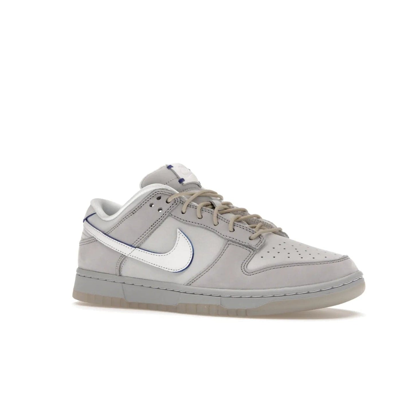 Nike Dunk Low Wolf Grey Pure Platinum - Image 4 - Only at www.BallersClubKickz.com - A timeless classic. The Nike Dunk Low Wolf Grey Pure Platinum combines wolf grey and pure platinum for a unique and eye-catching look. Available on August 15, 2022.