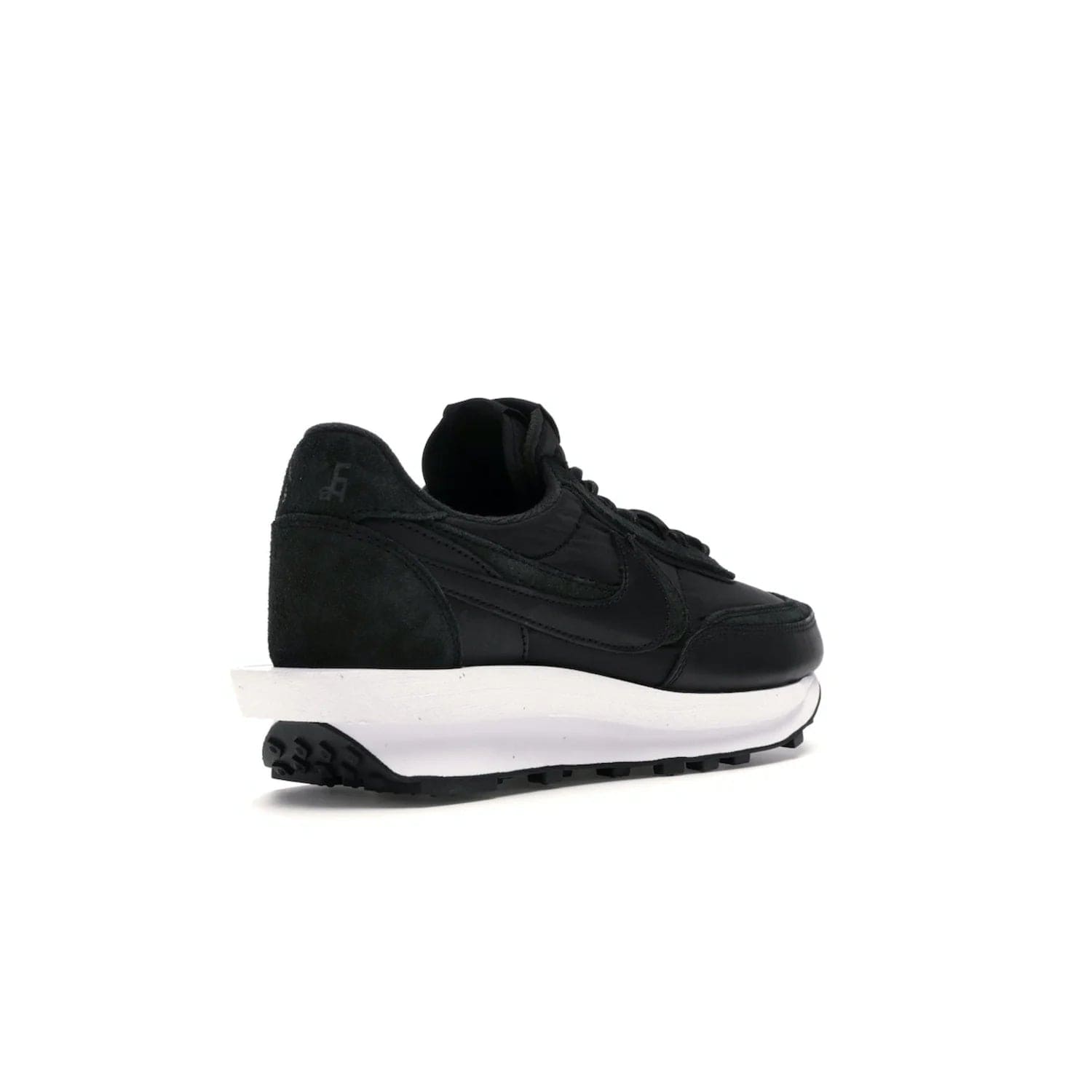 Nike LD Waffle sacai Black Nylon - Image 32 - Only at www.BallersClubKickz.com - Upgrade your streetstyle with the Nike LD Waffle Sacai Black Nylon. Get the iconic look of a doubled sole, tongue, and swoosh with no extra laces needed, inspired by modern fashion for spring. Step up your fashion with this luxurious combination of black nylon and suede. Shop the Nike LD Waffle Sacai Black Nylon sneaker today.