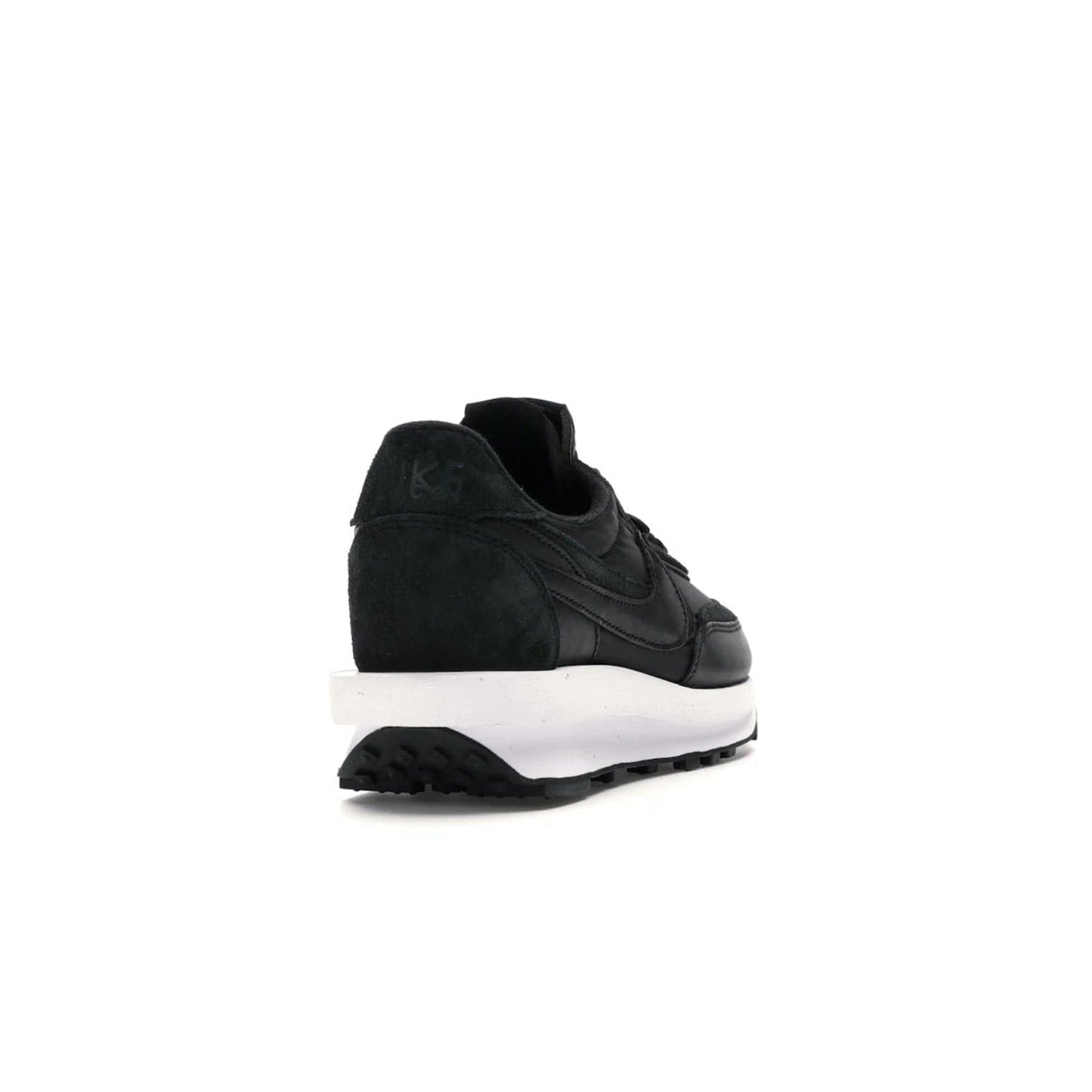 Nike LD Waffle sacai Black Nylon - Image 30 - Only at www.BallersClubKickz.com - Upgrade your streetstyle with the Nike LD Waffle Sacai Black Nylon. Get the iconic look of a doubled sole, tongue, and swoosh with no extra laces needed, inspired by modern fashion for spring. Step up your fashion with this luxurious combination of black nylon and suede. Shop the Nike LD Waffle Sacai Black Nylon sneaker today.