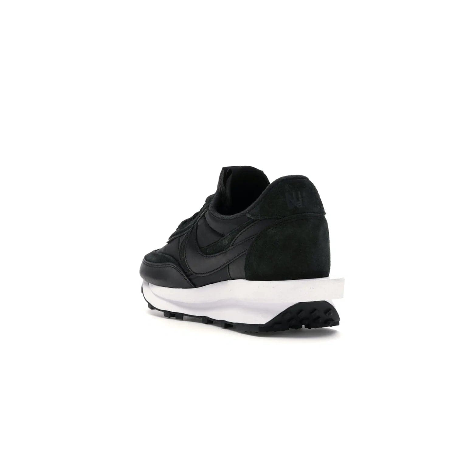 Nike LD Waffle sacai Black Nylon - Image 25 - Only at www.BallersClubKickz.com - Upgrade your streetstyle with the Nike LD Waffle Sacai Black Nylon. Get the iconic look of a doubled sole, tongue, and swoosh with no extra laces needed, inspired by modern fashion for spring. Step up your fashion with this luxurious combination of black nylon and suede. Shop the Nike LD Waffle Sacai Black Nylon sneaker today.