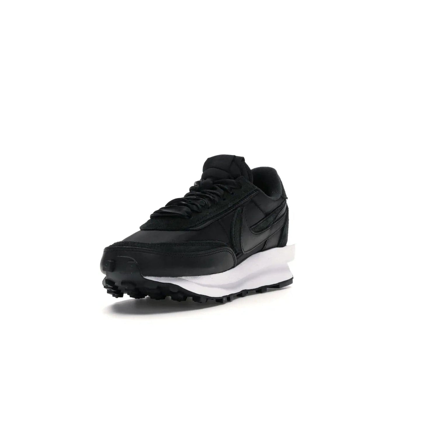 Nike LD Waffle sacai Black Nylon - Image 13 - Only at www.BallersClubKickz.com - Upgrade your streetstyle with the Nike LD Waffle Sacai Black Nylon. Get the iconic look of a doubled sole, tongue, and swoosh with no extra laces needed, inspired by modern fashion for spring. Step up your fashion with this luxurious combination of black nylon and suede. Shop the Nike LD Waffle Sacai Black Nylon sneaker today.