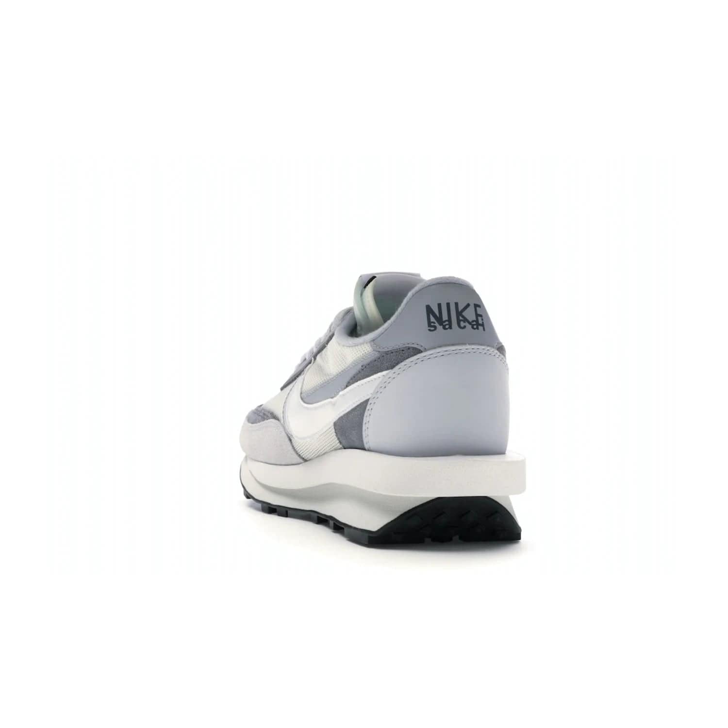 Nike LD Waffle sacai Summit White - Image 26 - Only at www.BallersClubKickz.com - Mesh fashion and comfort into your wardrobe with the Nike LD Waffle Sacai Summit White. Featuring a white upper, grey accents and overlapped white and grey Nike "Swoosh," these sneakers offer perfect balance of comfort and style. Perfect for office or a night out.