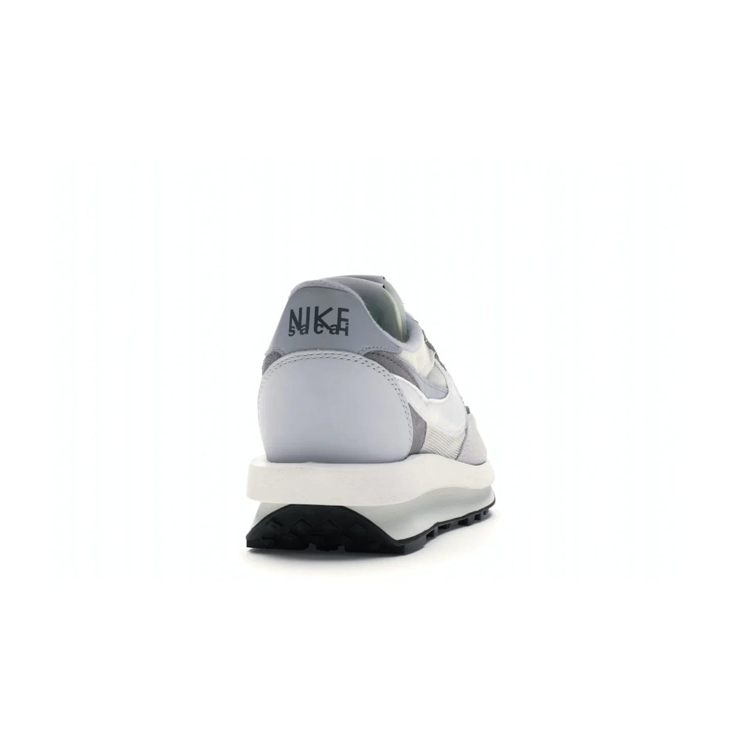 Nike LD Waffle sacai Summit White - Image 29 - Only at www.BallersClubKickz.com - Mesh fashion and comfort into your wardrobe with the Nike LD Waffle Sacai Summit White. Featuring a white upper, grey accents and overlapped white and grey Nike "Swoosh," these sneakers offer perfect balance of comfort and style. Perfect for office or a night out.