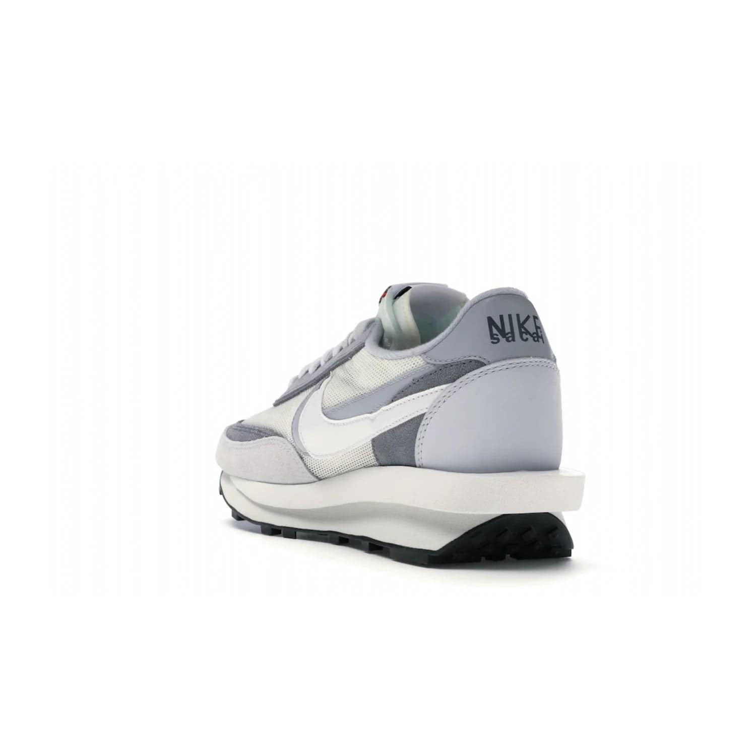 Nike LD Waffle sacai Summit White - Image 25 - Only at www.BallersClubKickz.com - Mesh fashion and comfort into your wardrobe with the Nike LD Waffle Sacai Summit White. Featuring a white upper, grey accents and overlapped white and grey Nike "Swoosh," these sneakers offer perfect balance of comfort and style. Perfect for office or a night out.