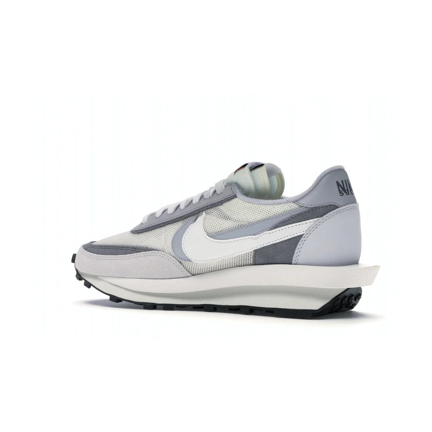 Nike LD Waffle sacai Summit White - Image 22 - Only at www.BallersClubKickz.com - Mesh fashion and comfort into your wardrobe with the Nike LD Waffle Sacai Summit White. Featuring a white upper, grey accents and overlapped white and grey Nike "Swoosh," these sneakers offer perfect balance of comfort and style. Perfect for office or a night out.