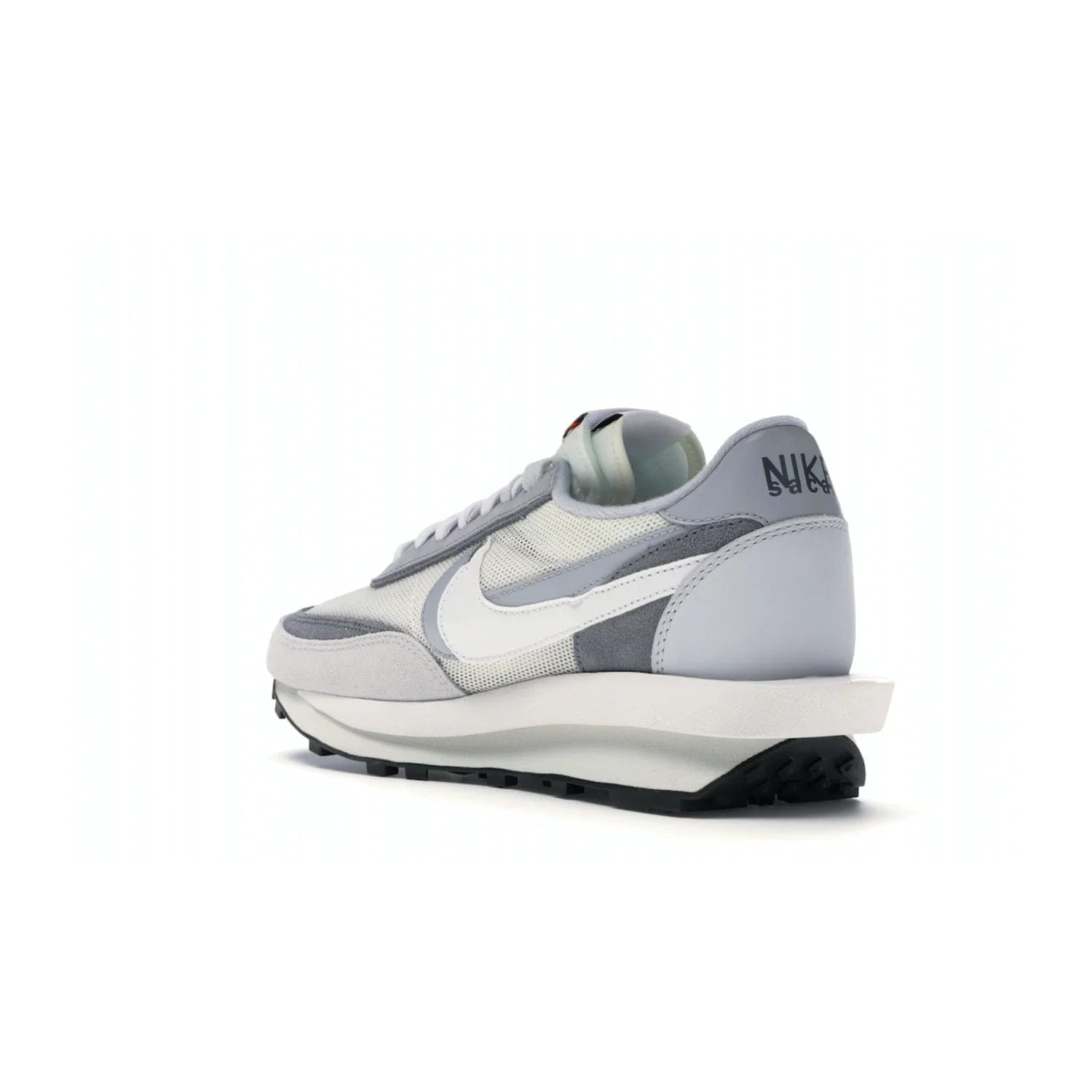 Nike LD Waffle sacai Summit White - Image 24 - Only at www.BallersClubKickz.com - Mesh fashion and comfort into your wardrobe with the Nike LD Waffle Sacai Summit White. Featuring a white upper, grey accents and overlapped white and grey Nike "Swoosh," these sneakers offer perfect balance of comfort and style. Perfect for office or a night out.